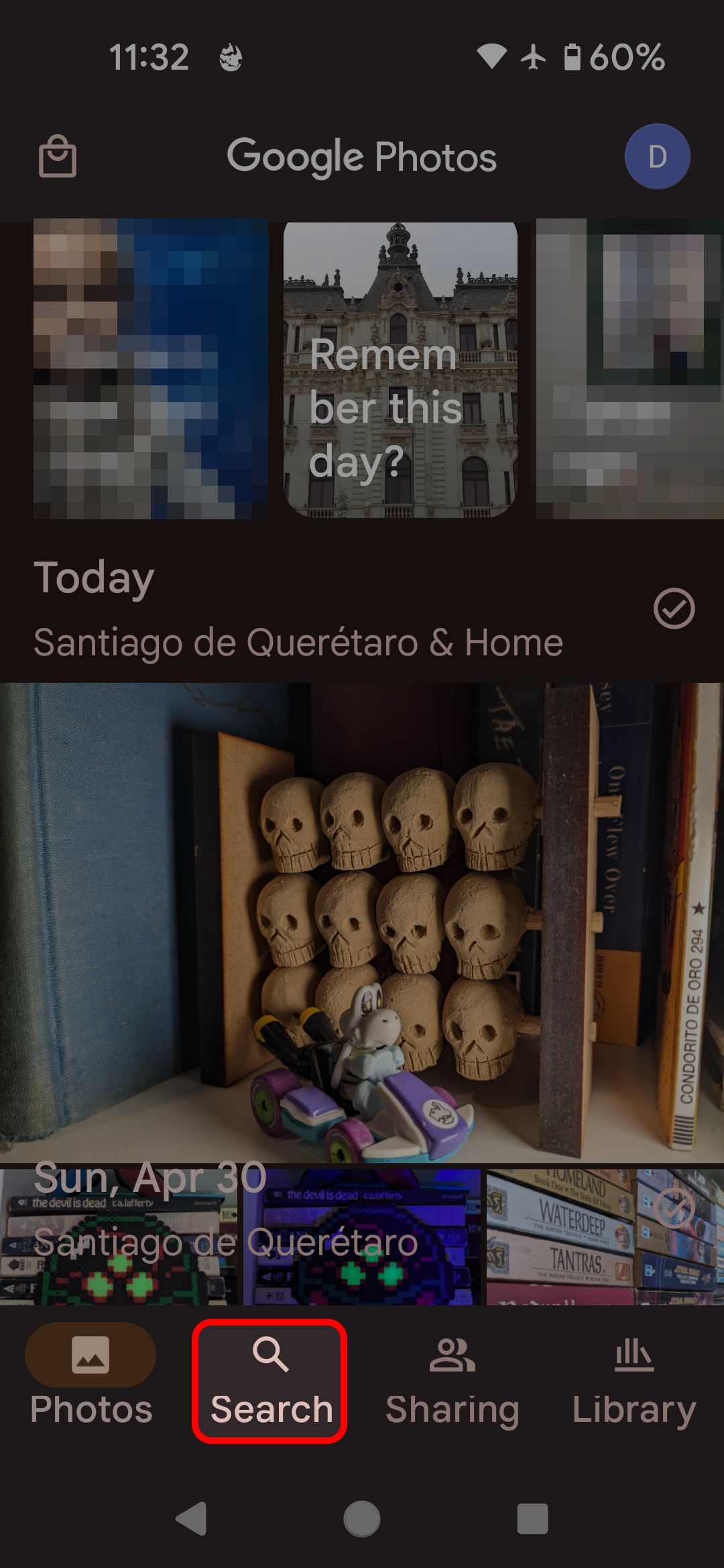 Tapping the Search button on the Google Photos app