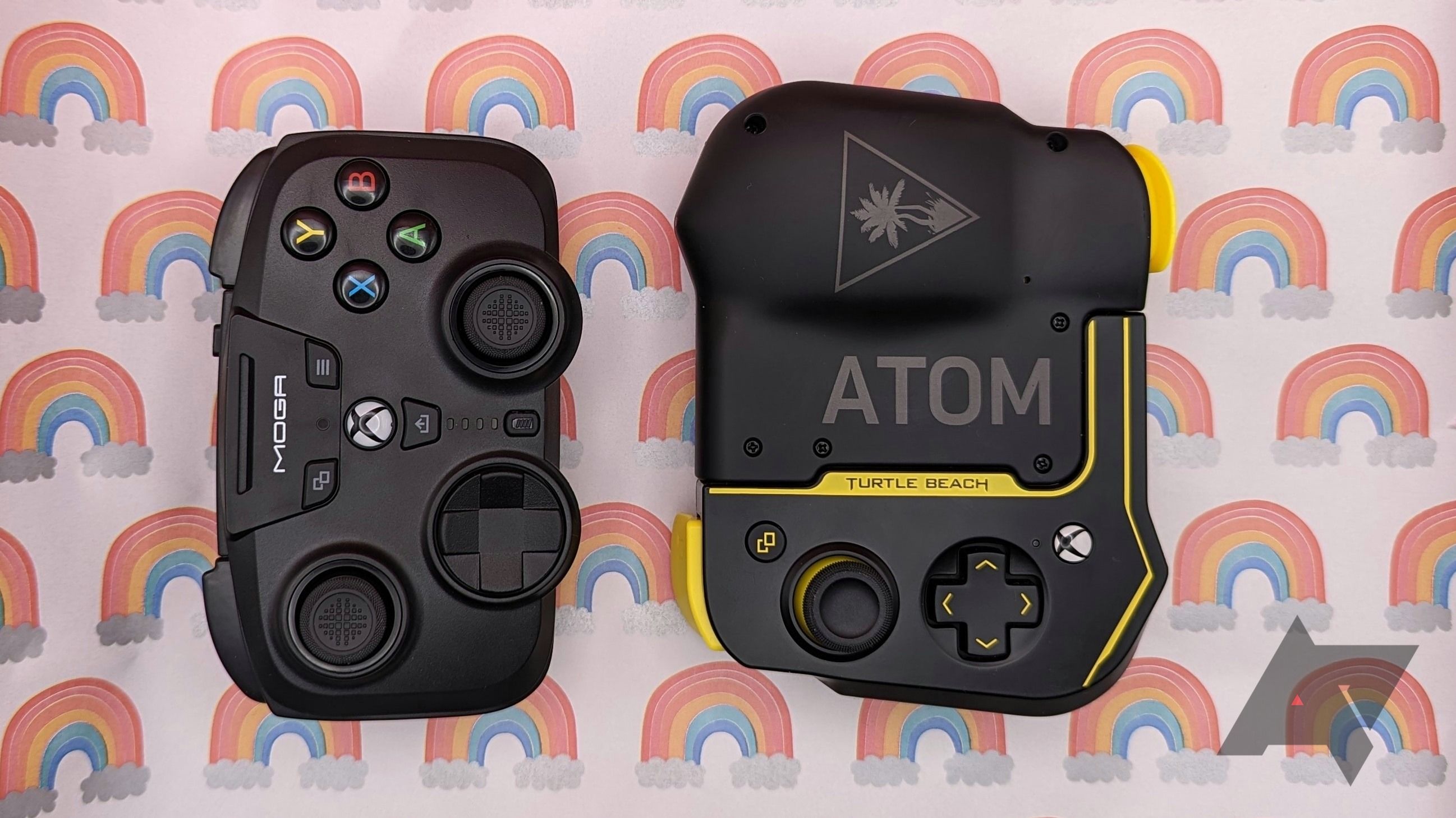 two game controllers side by side on rainbow background
