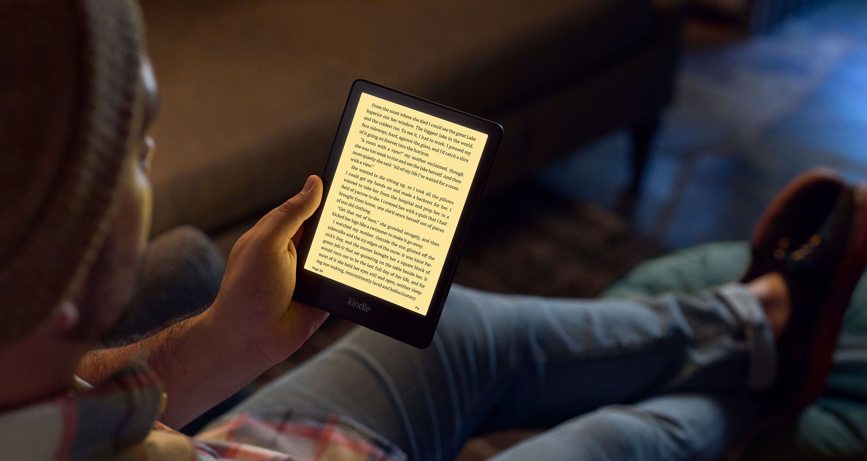 person reading kindle paperwhite