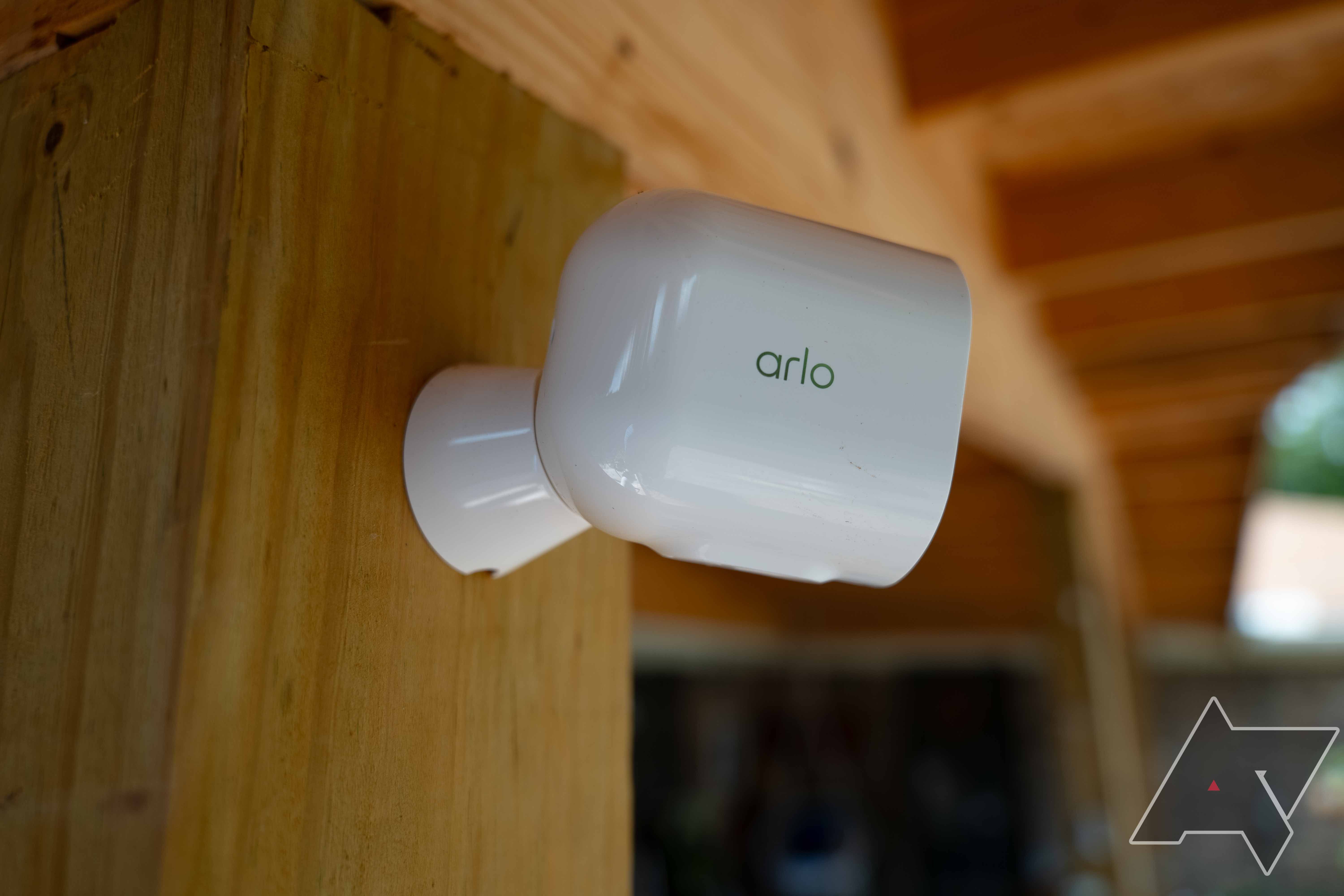 Side view of the Arlo Pro 4 attached to its magnetic mount
