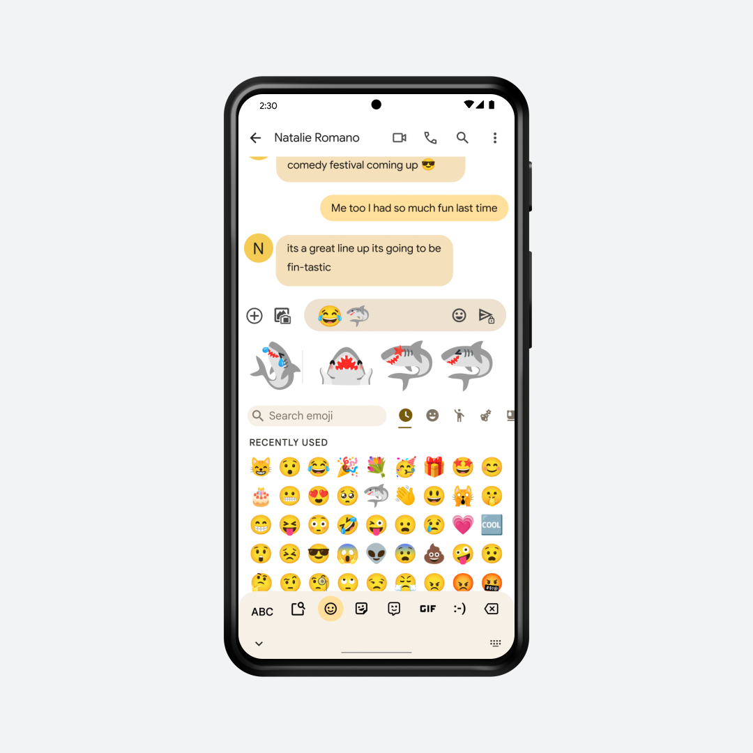 Render of phone with Gboard's emoji picker opened, showing shark combo creations