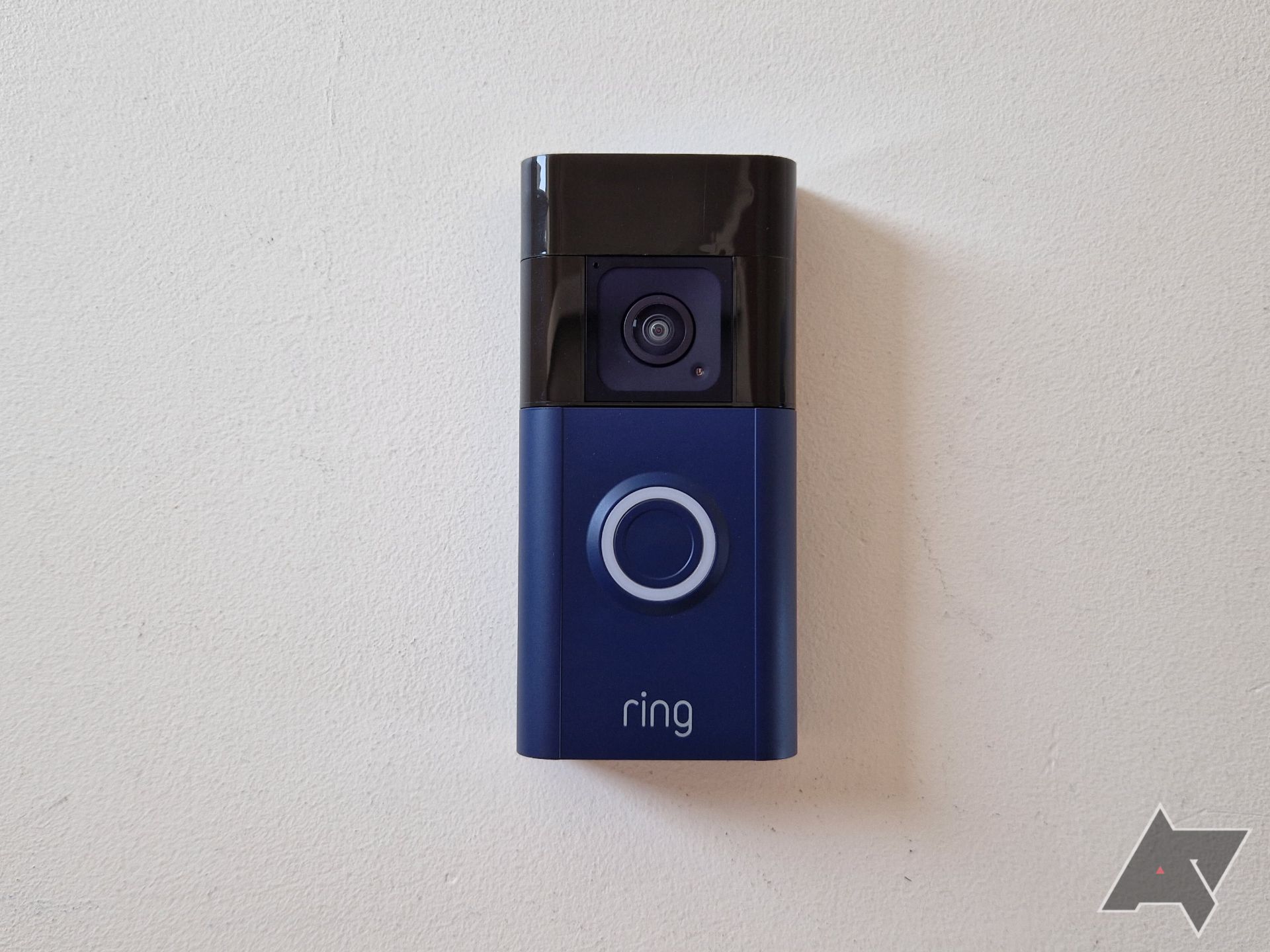 Ring Battery Doorbell Plus with a navy blue faceplate