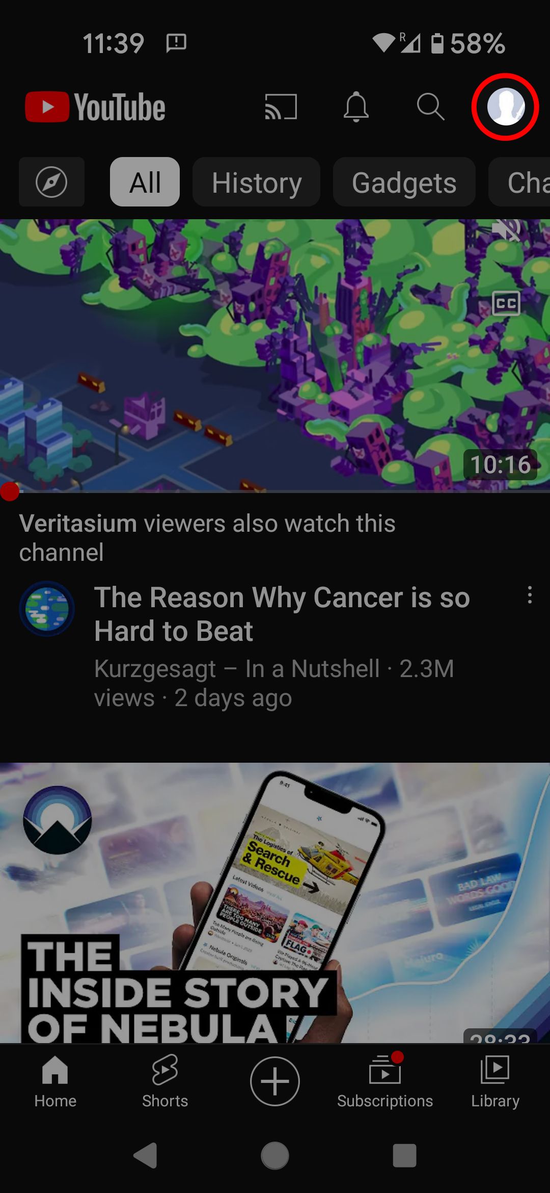 YouTube mobile homepage highlighting the user icon