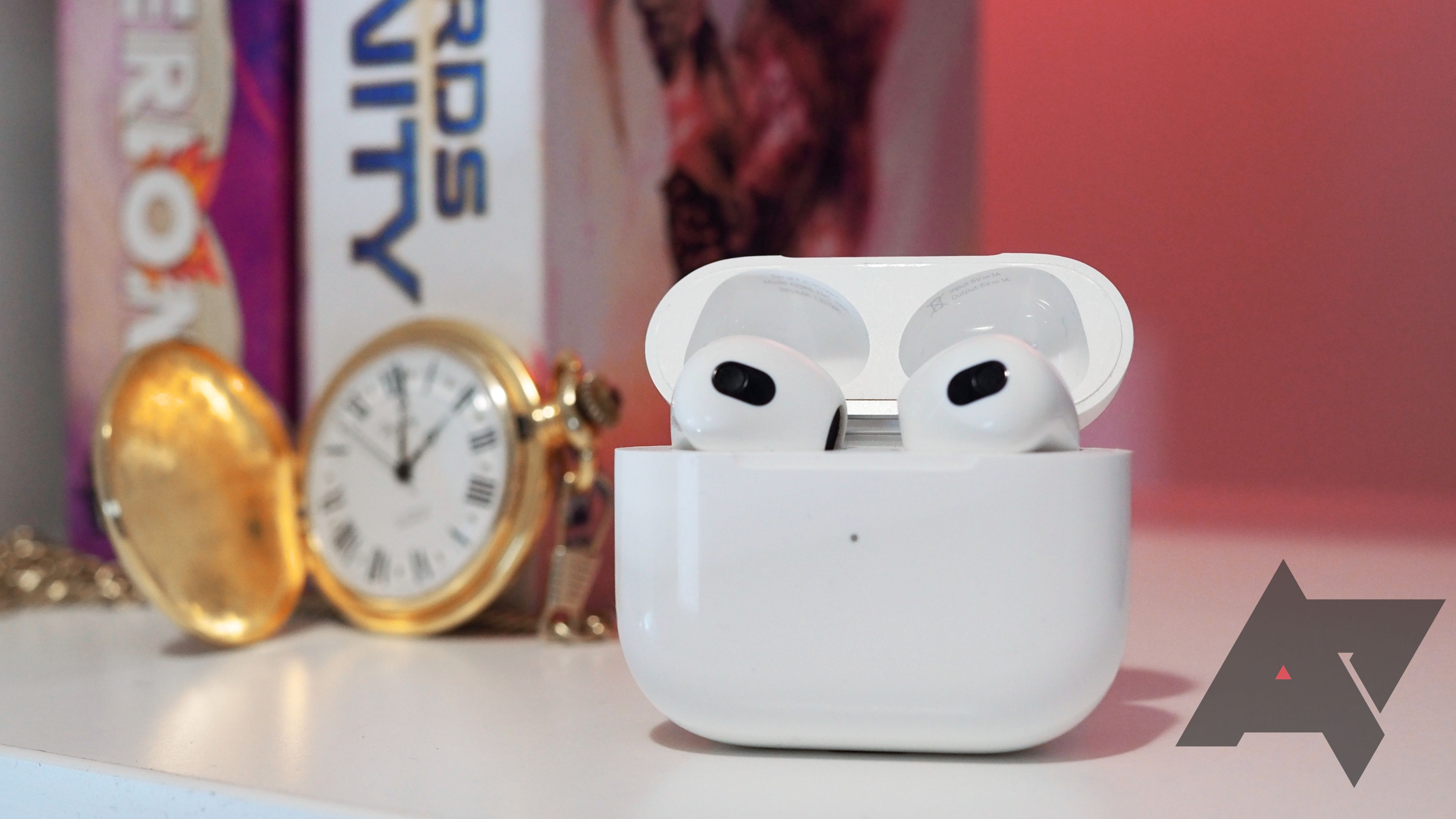 A pair of Apple Airpods 3 in a charging case