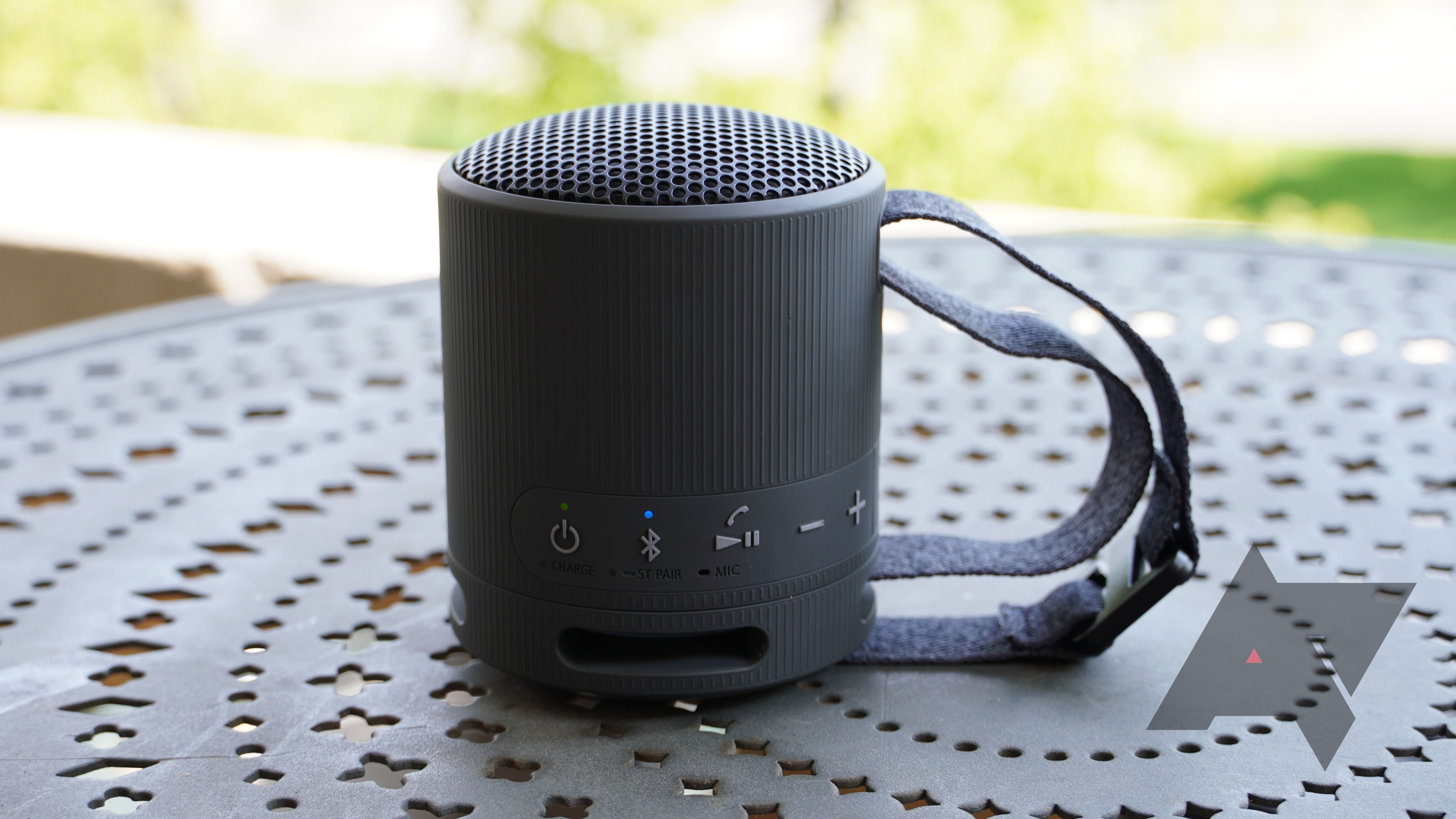 Sony SRS-XB100 Bluetooth speaker standing on a table