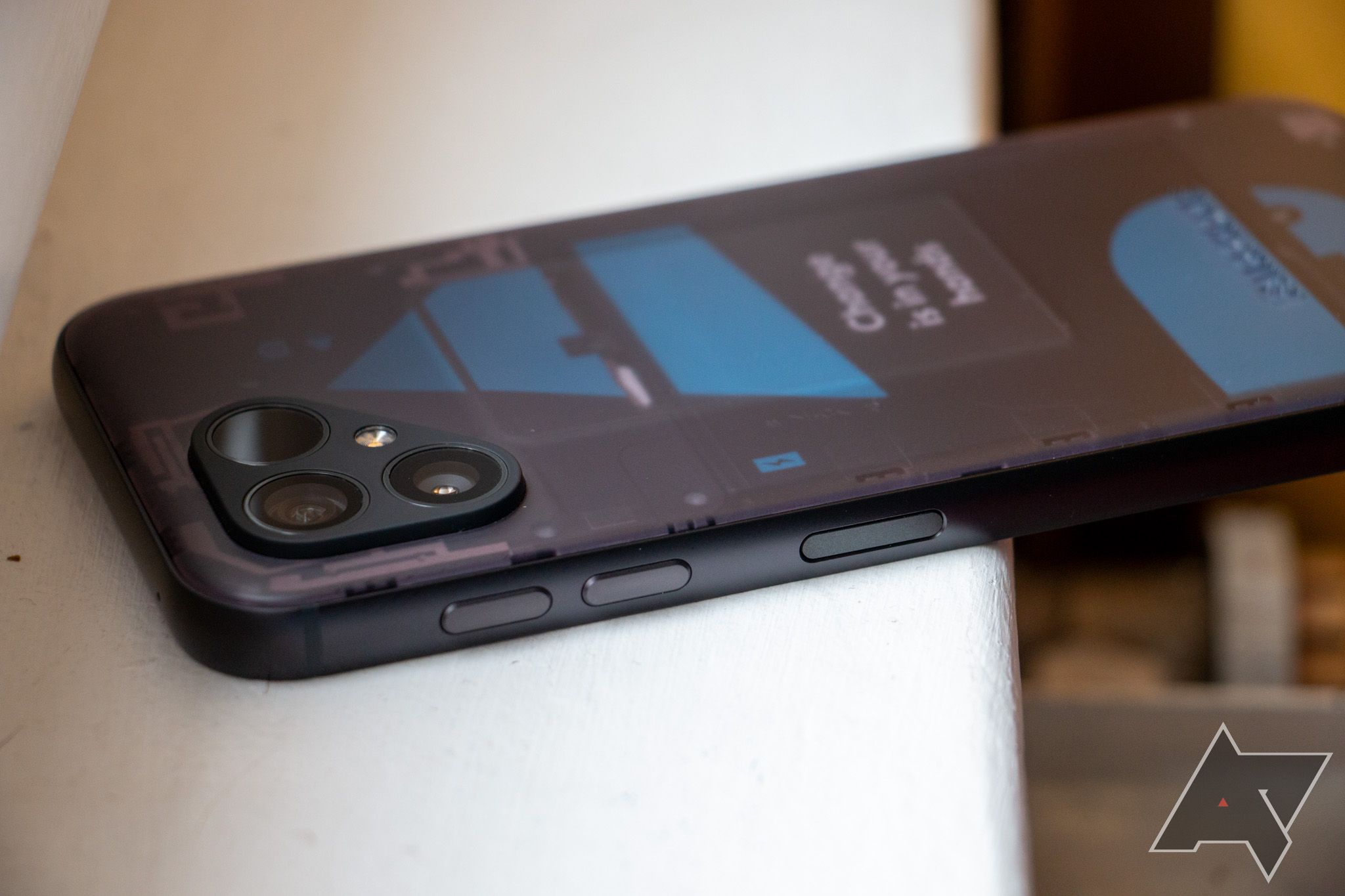 The Fairphone 5 showing the power, volume, and camera