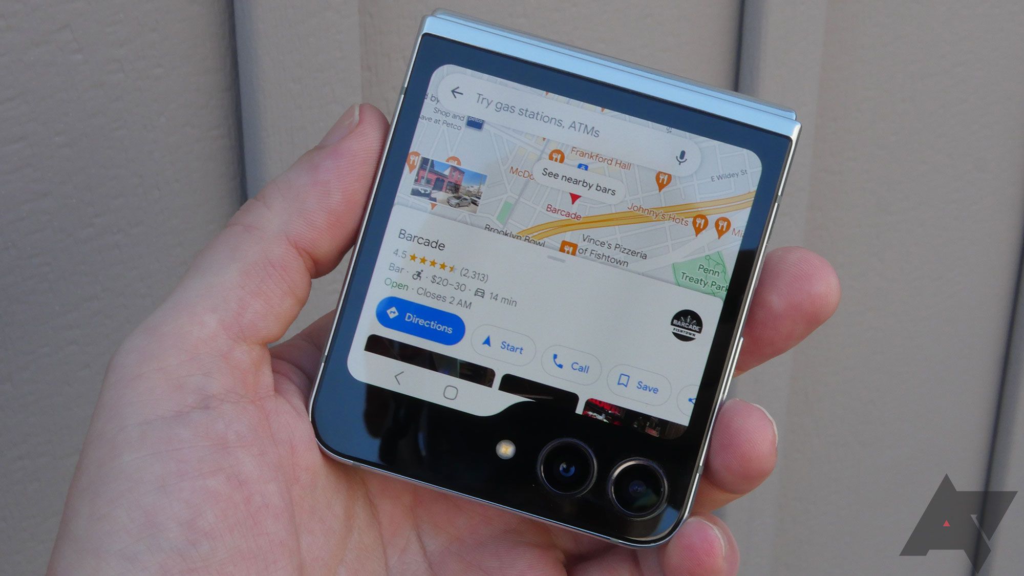 The Galaxy Z Flip 5 showing Google Maps on the outer screen.