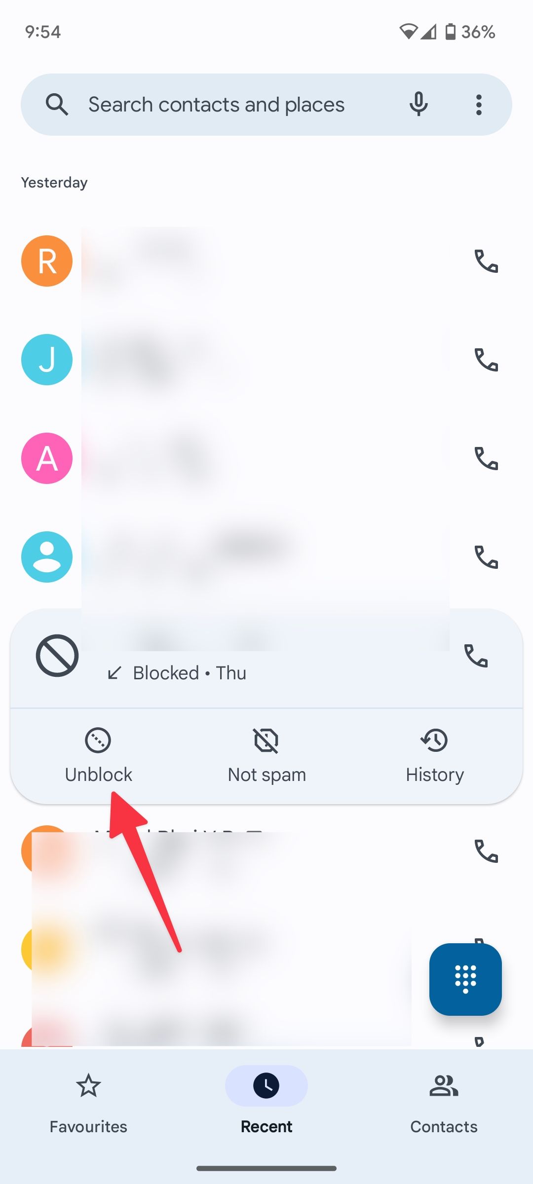 red solid arrow pointing to unblock option in the recent menu on Phone app