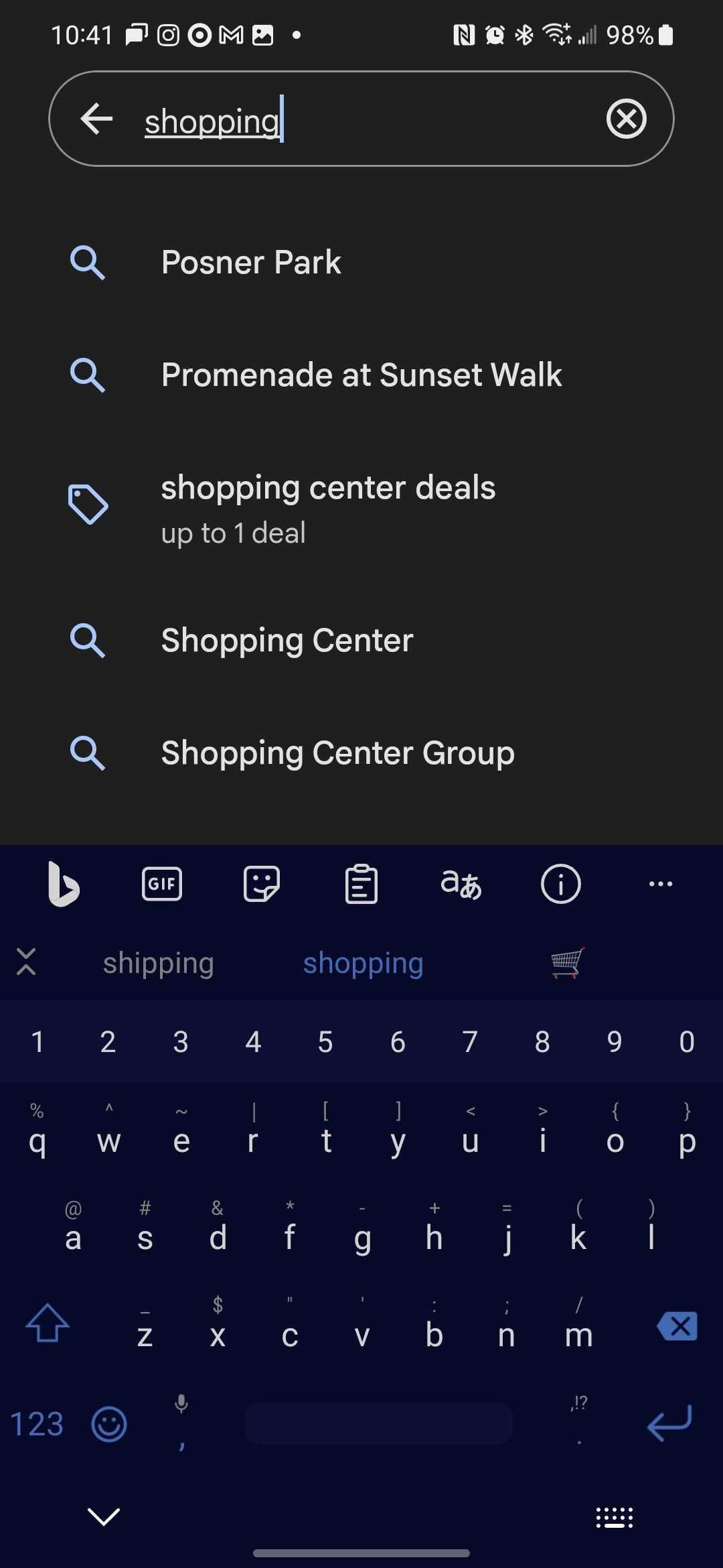 Google Pay in dark mode with the word Shopping typed in the search bar