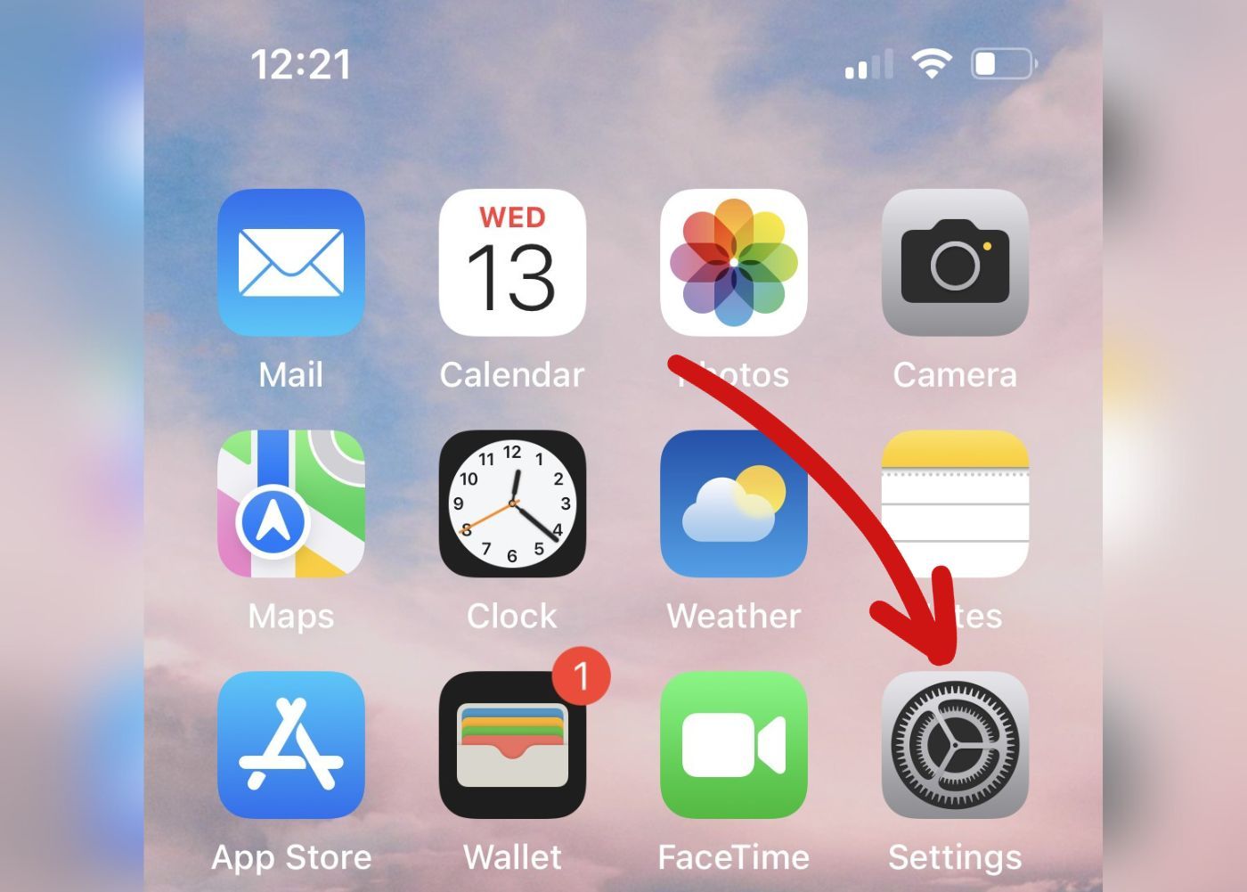 screenshot of iOS device with an arrow pointing to settings icon