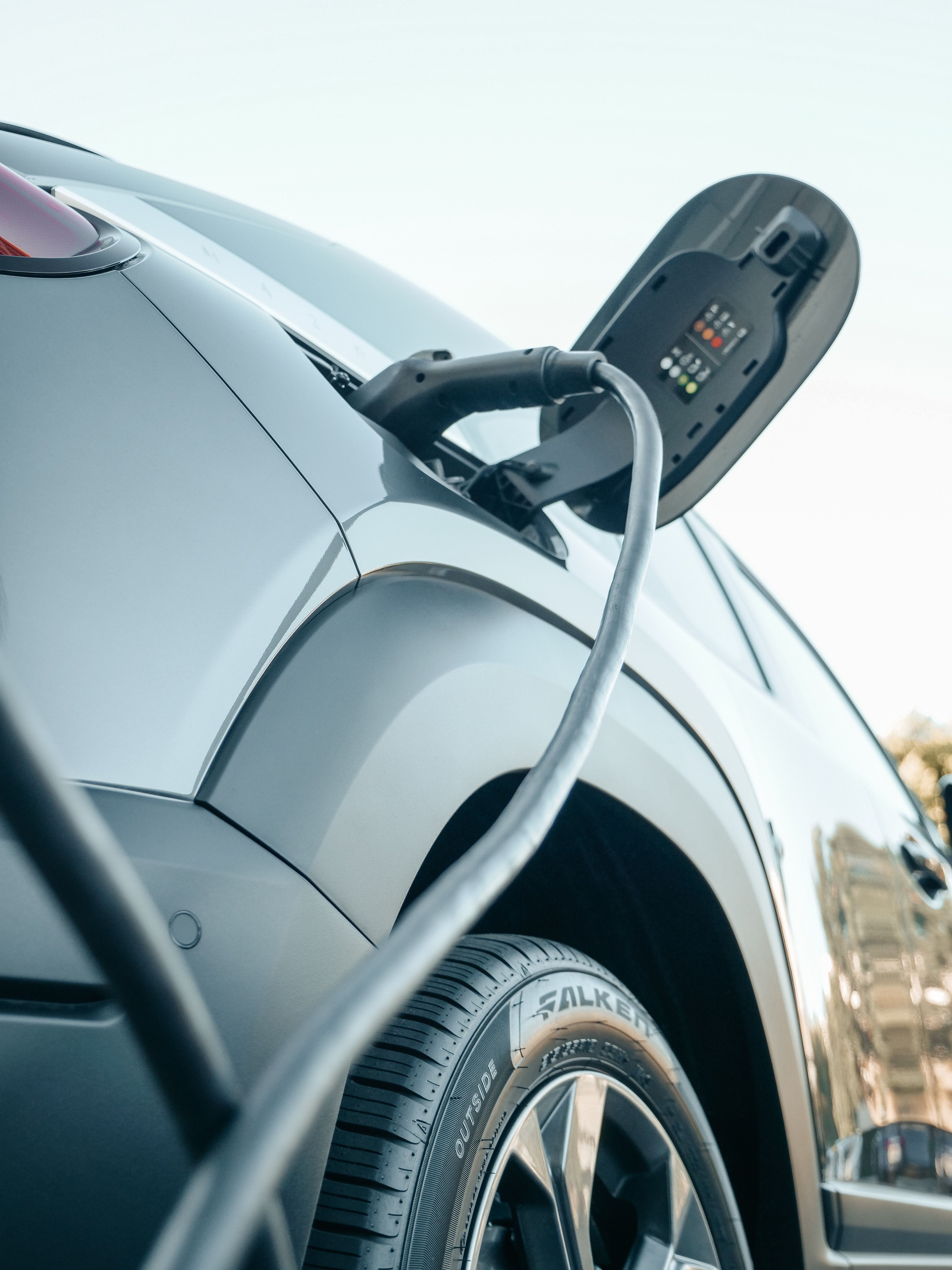 An electric automobile displaying the charging port