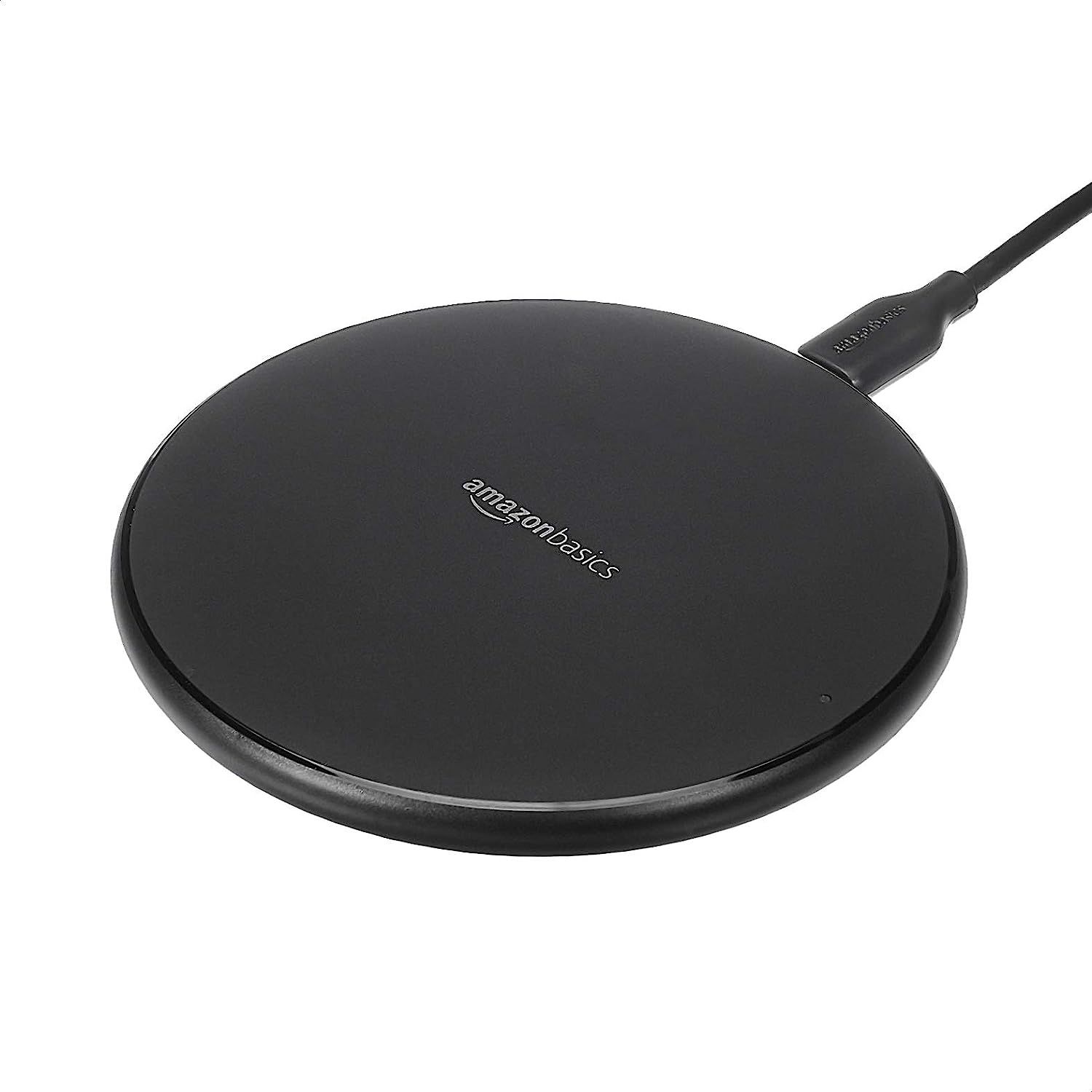 Amazon Basics 15W Qi Certified Wireless Charging Pad on a white background