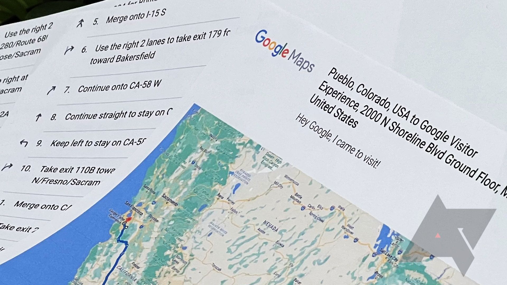 Google Maps directions are shown printed on paper.