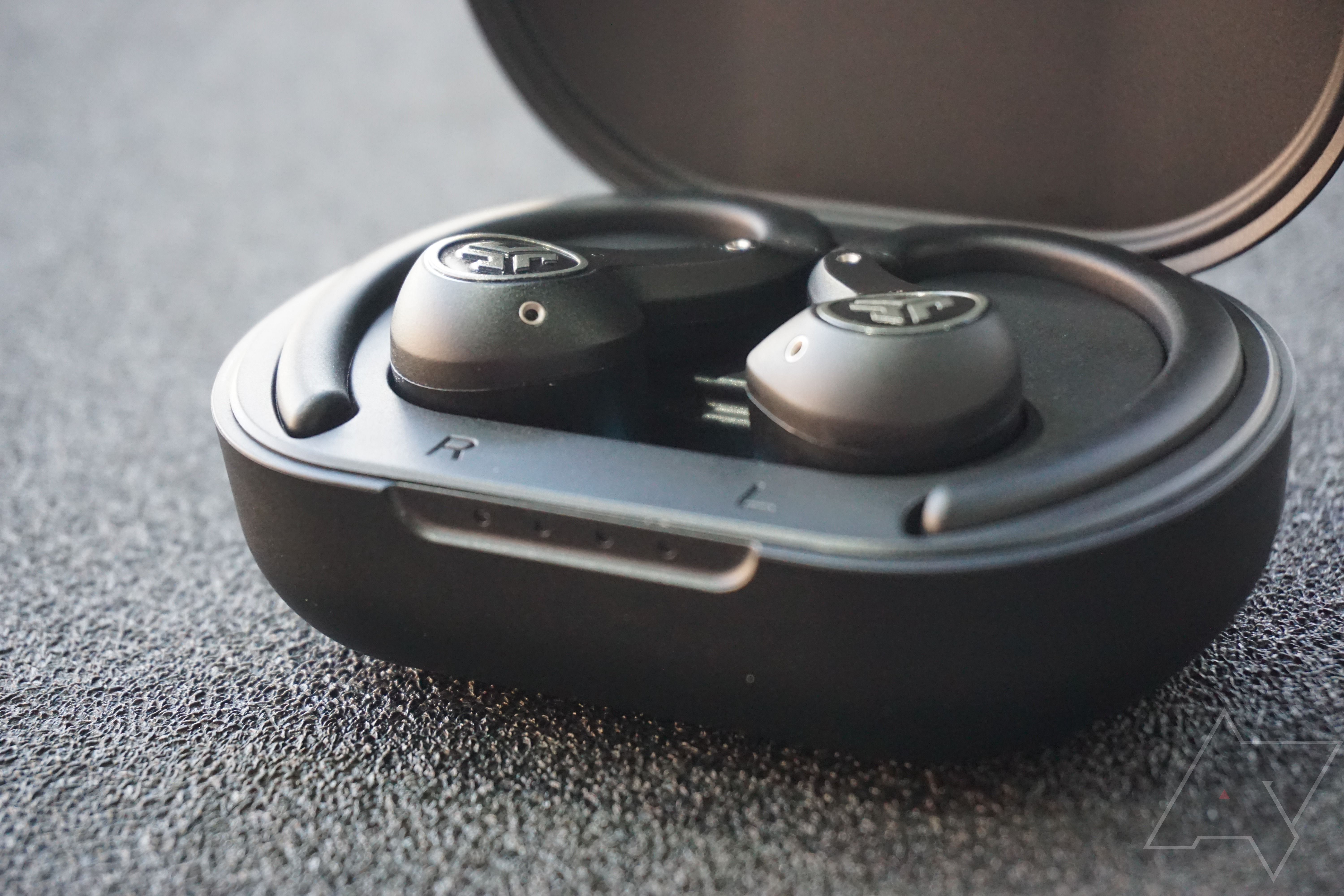 A closeup of the JLab Epic Air Sport earbuds in the case
