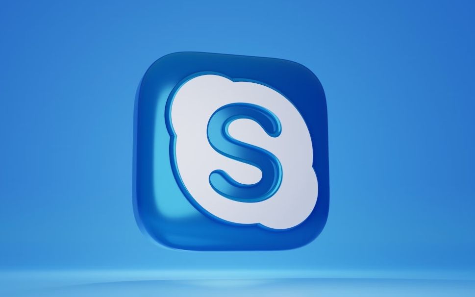 Skype 3D logo against a blue background.