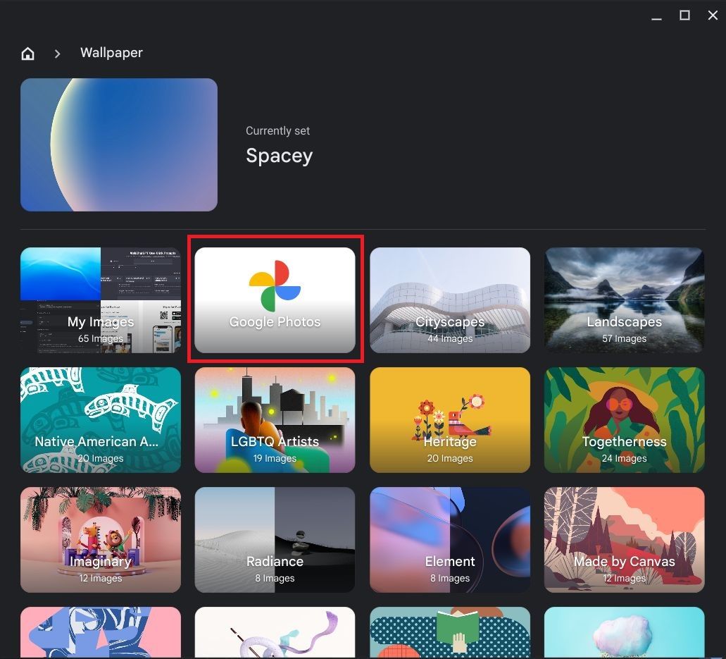 Screenshot highlighting the Google Photos choice below Wallpaper.