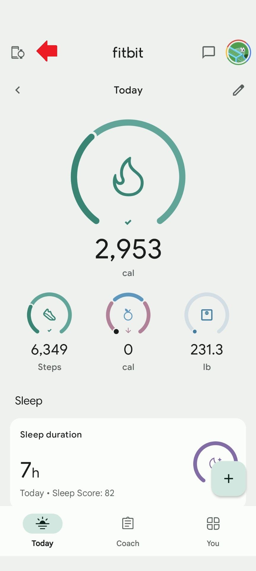 The Fitbit app homescreen with a red arrow pointing to the devices icon at the top left