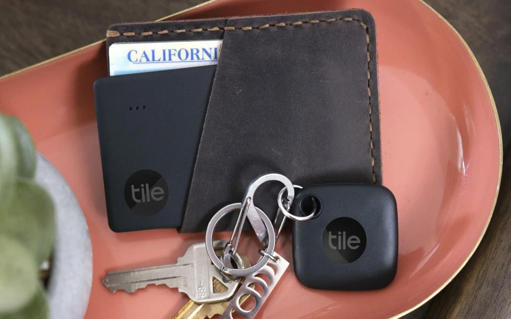 Tile Slim and Mate with a wallet and keys in a key dish