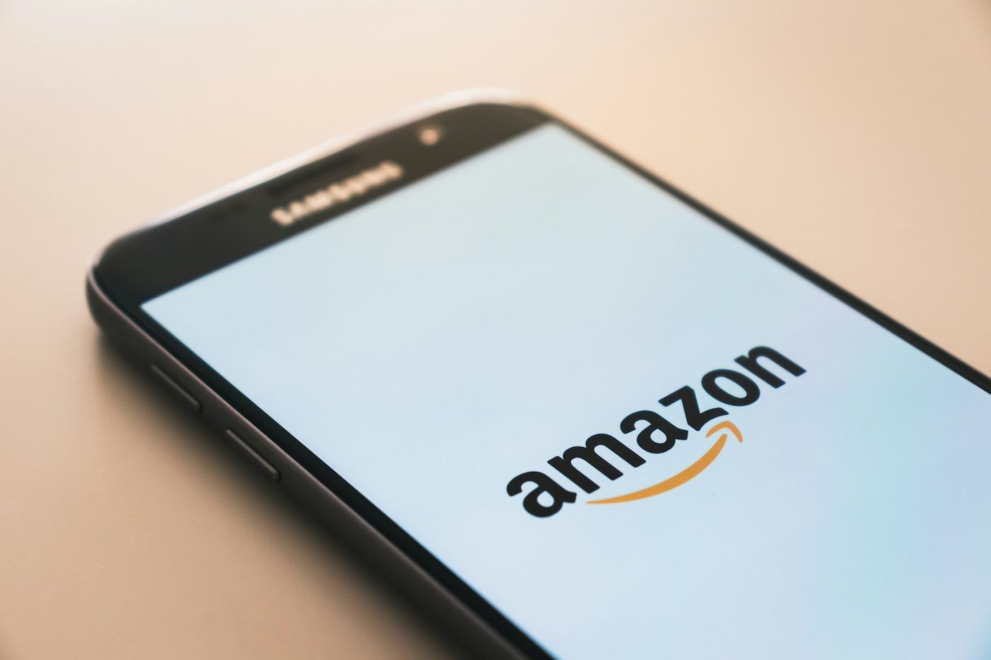 Amazon logo displayed on phone screen hero image