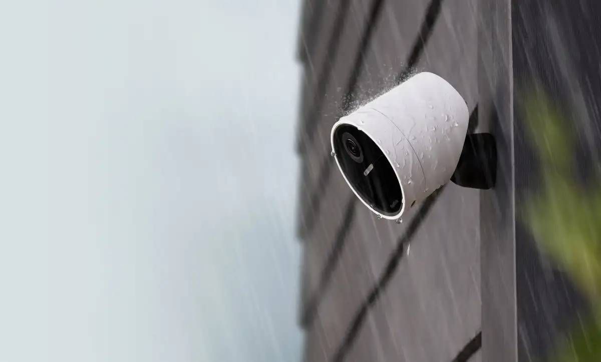 The SimpliSafe Outdoor wireless security camera during a rainstorm
