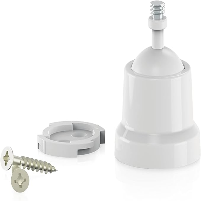 White Arlo camera mount next to screws and mounting hardware