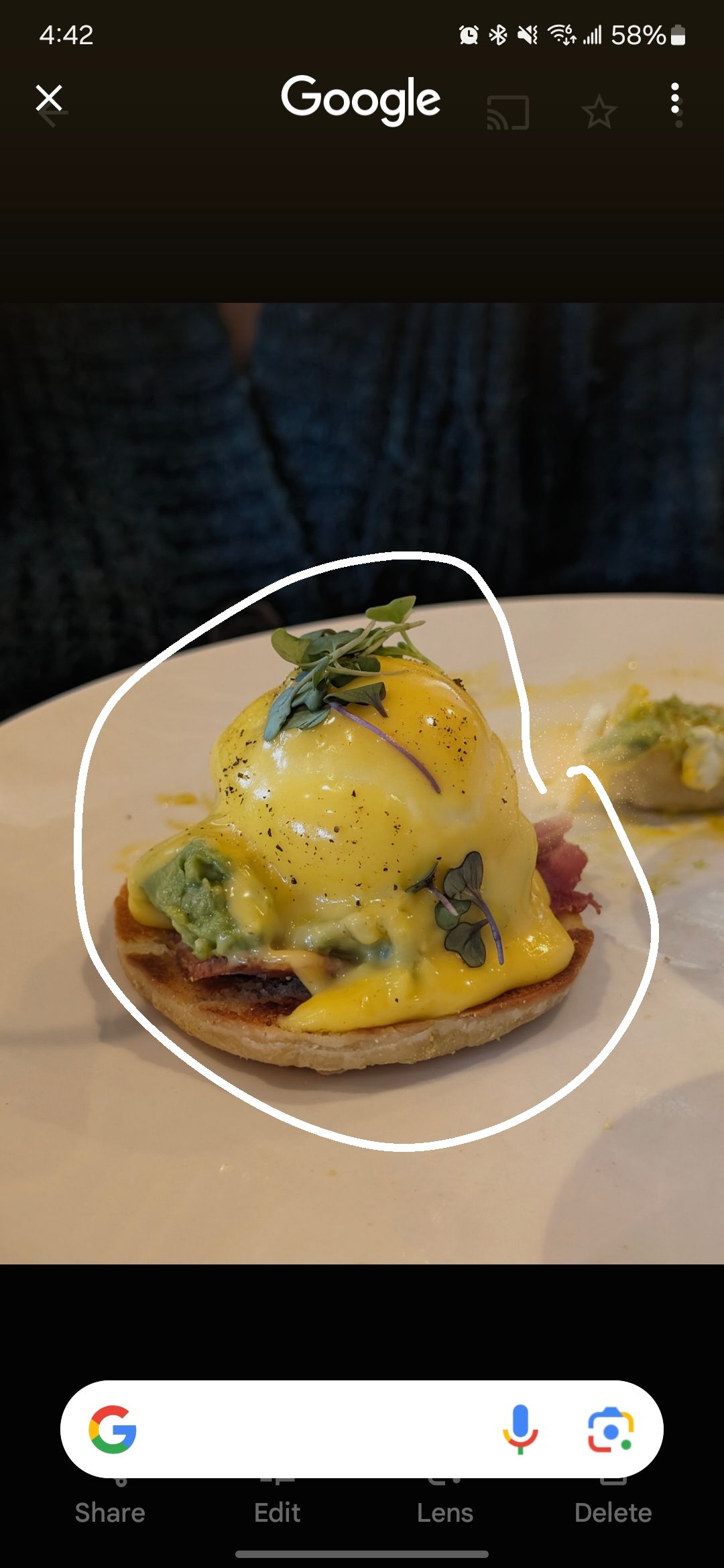 The Circle to Search interface with an image of eggs benedict circled