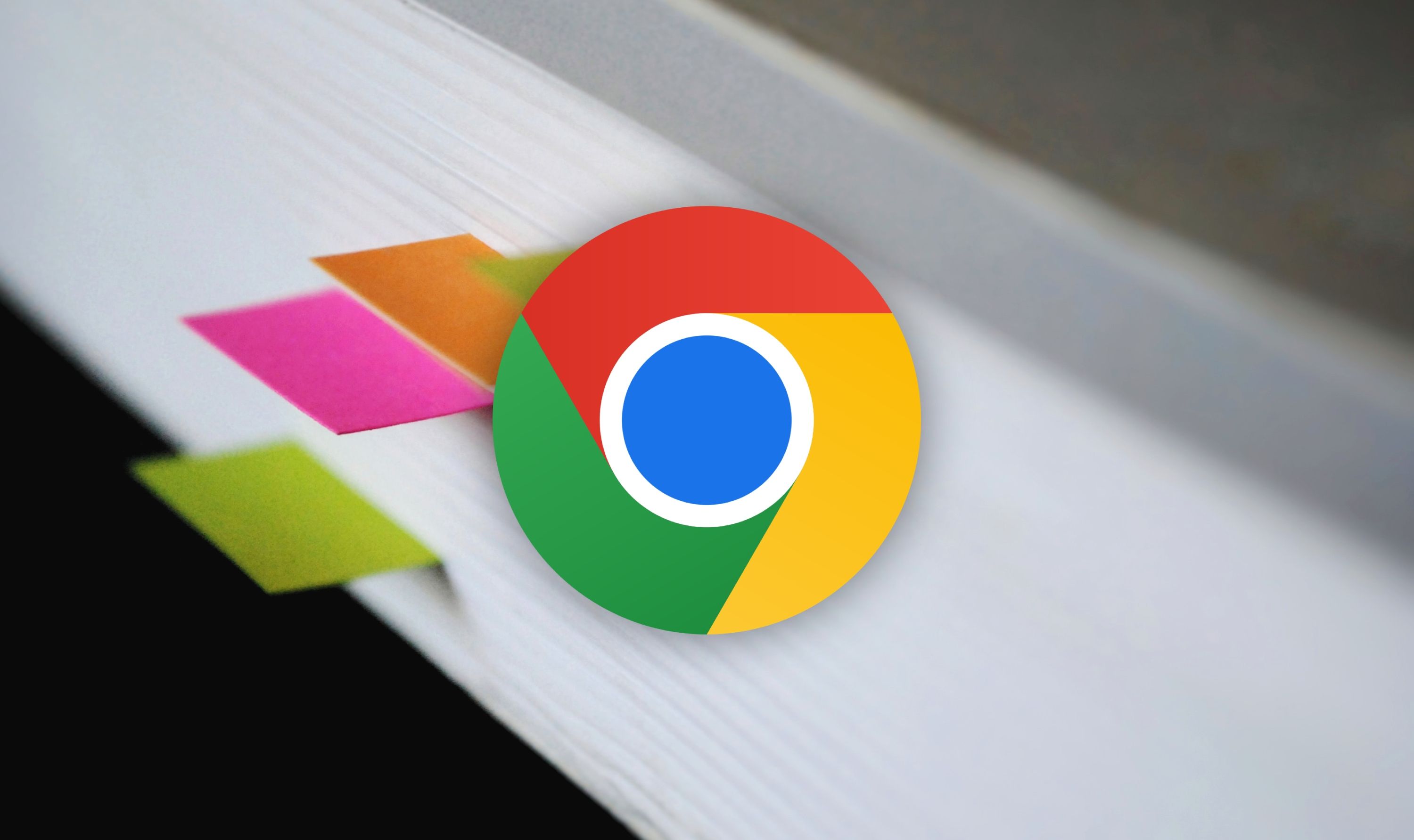 Google Chrome logo on a book that has bookmarks attached to pages.