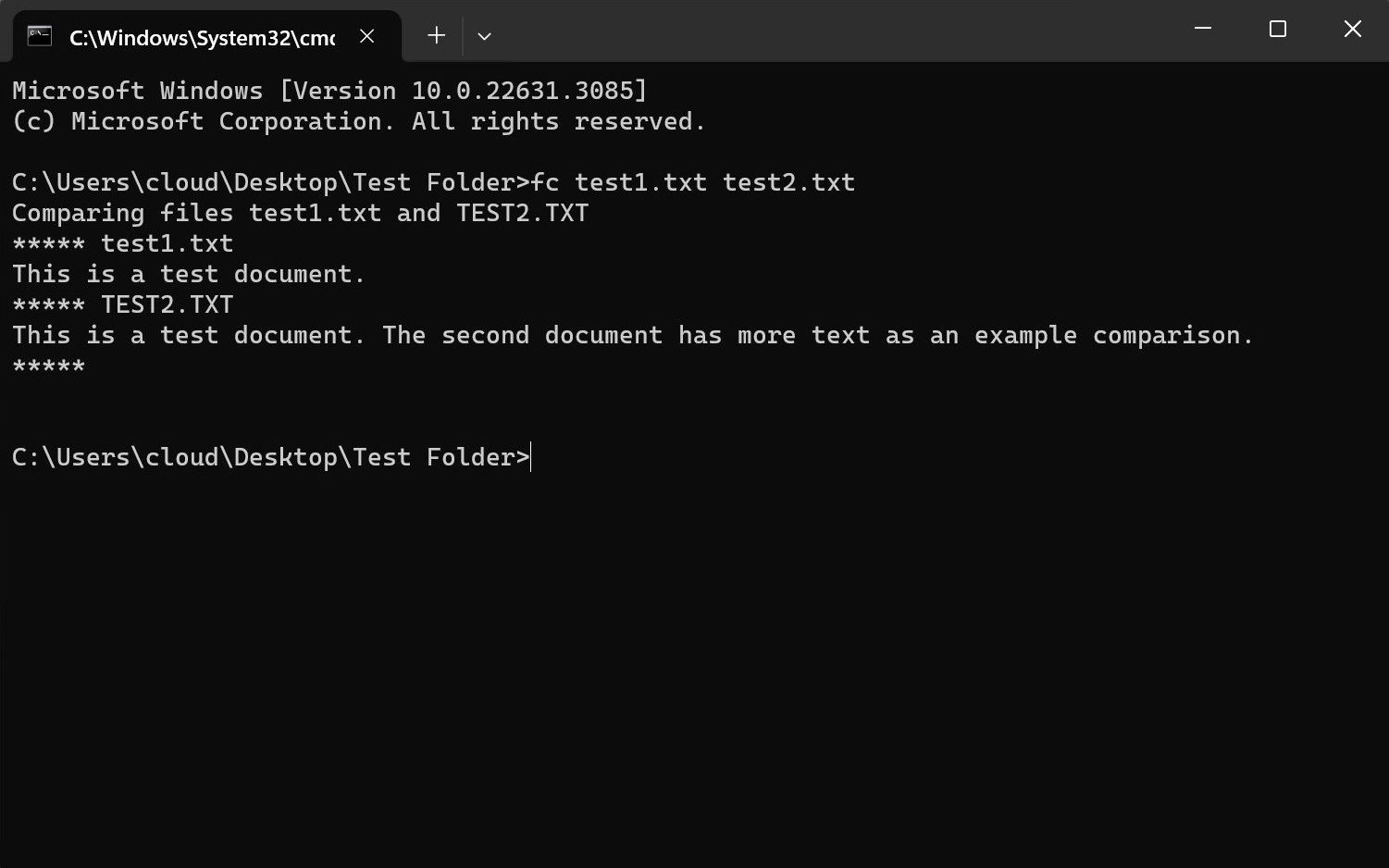 A Windows command prompt showing a command that compares two separate text files at once.