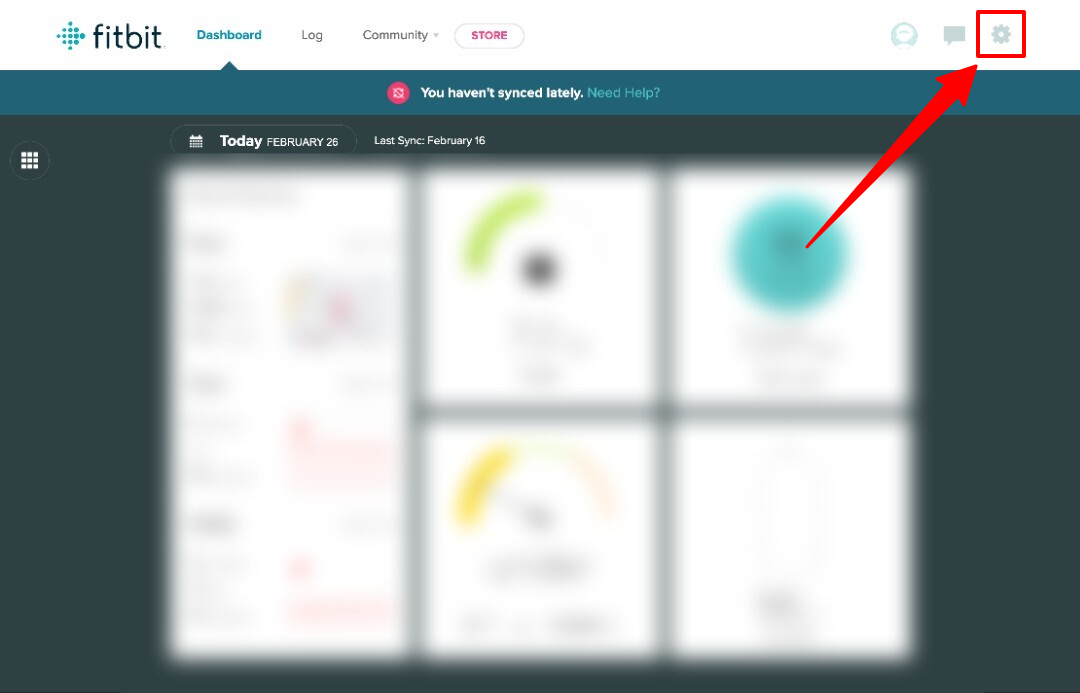 Screenshot of Fitbit web dashboard with arrow pointing to the settings icon.