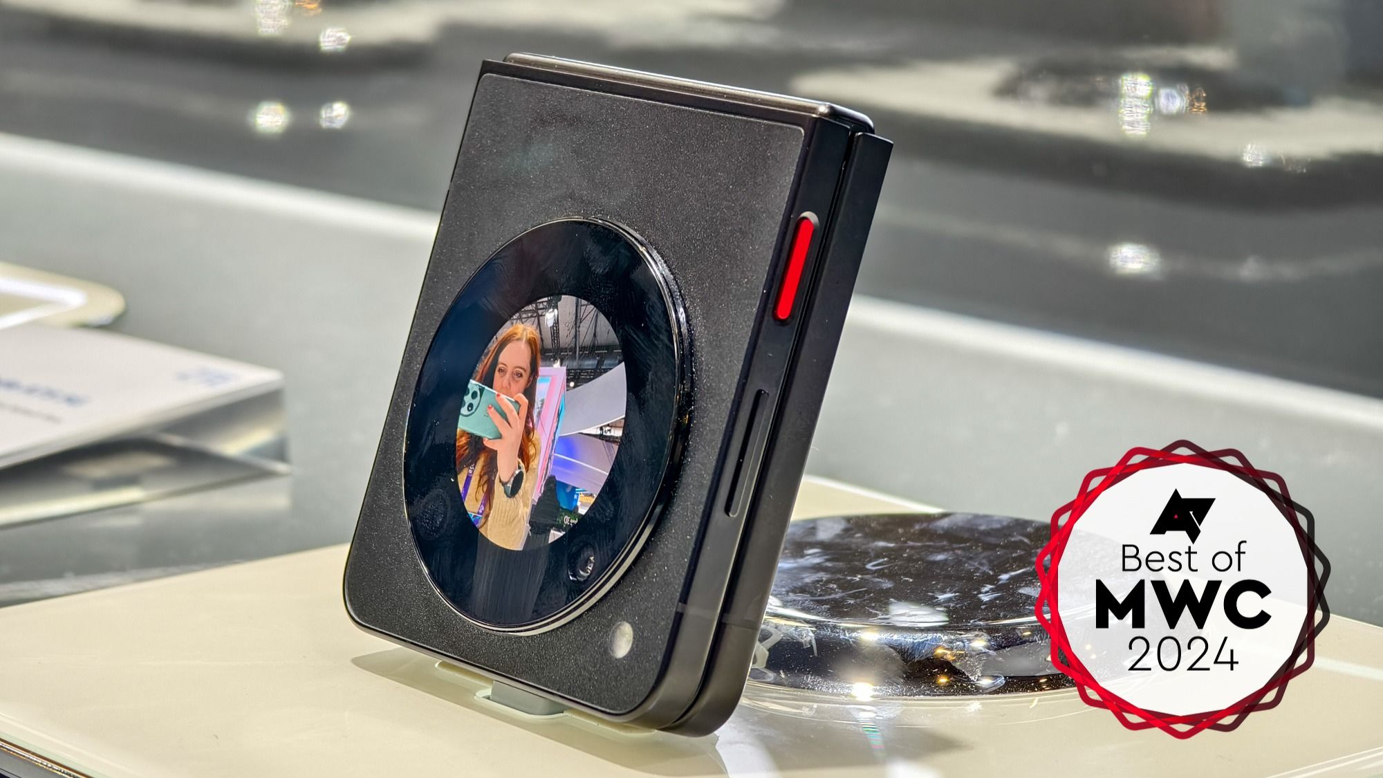 The Nubia Flip 5G folded up on a stand at MWC 2024