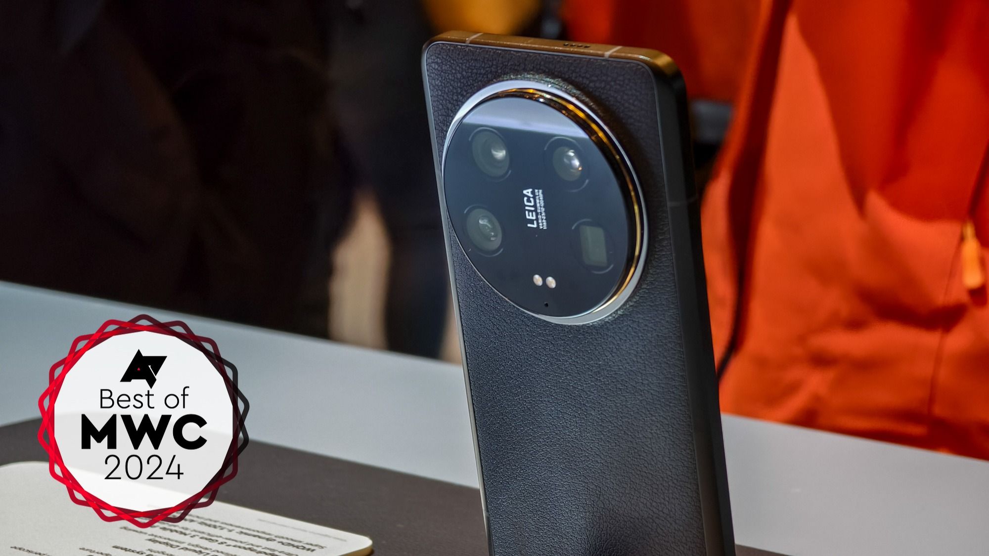 The Xiaomi 14 Ultra in black on a stand at MWC 2024