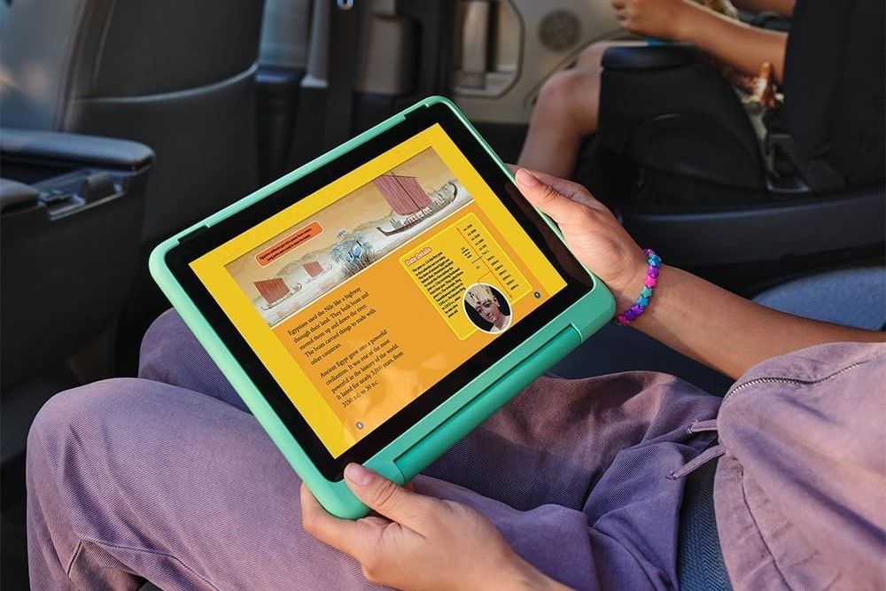 amazon fire hd 10 kids pro (2023) display held at an angle while in a vehicle