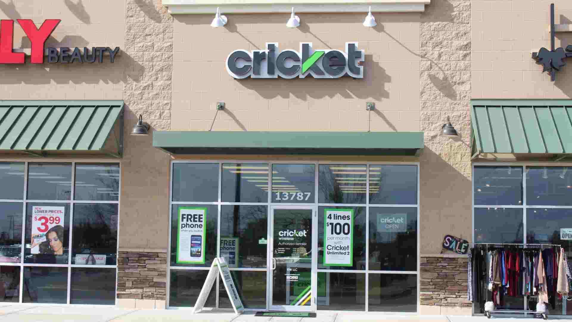 A photo of a Cricket Wireless store with a glass front and the Cricket logo at the top