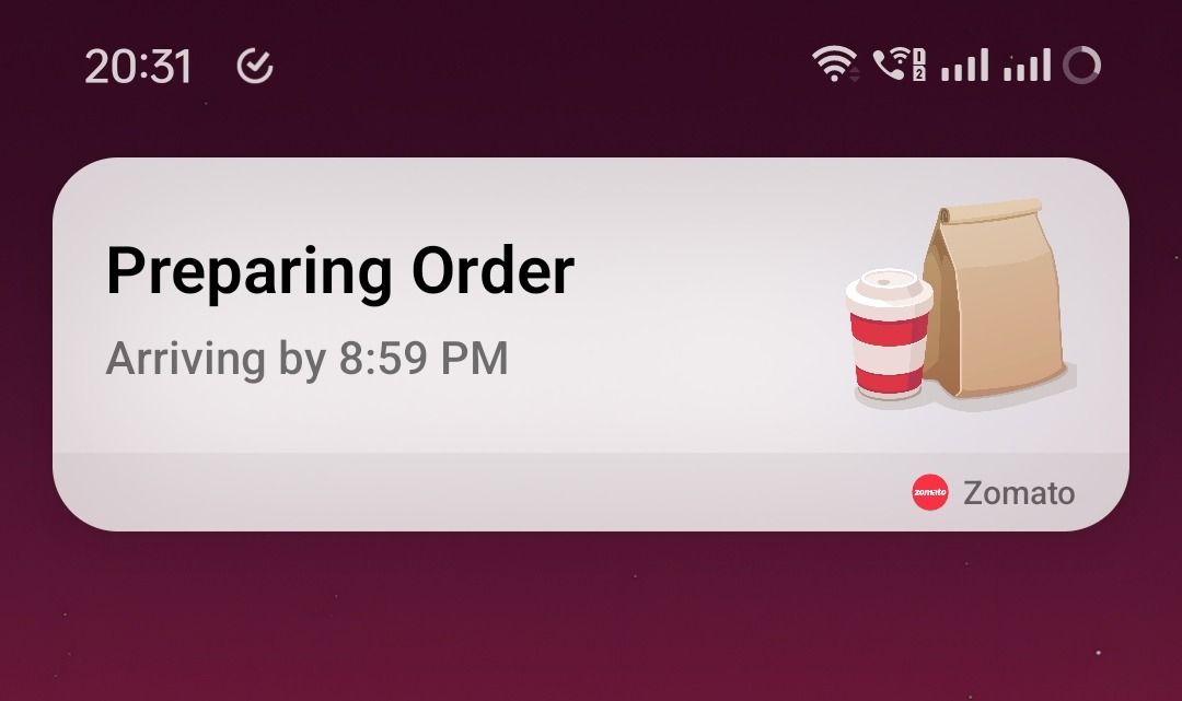 Zomato food delivery live status in an element like the Dynamic Island on the OnePlus Open running Android 14