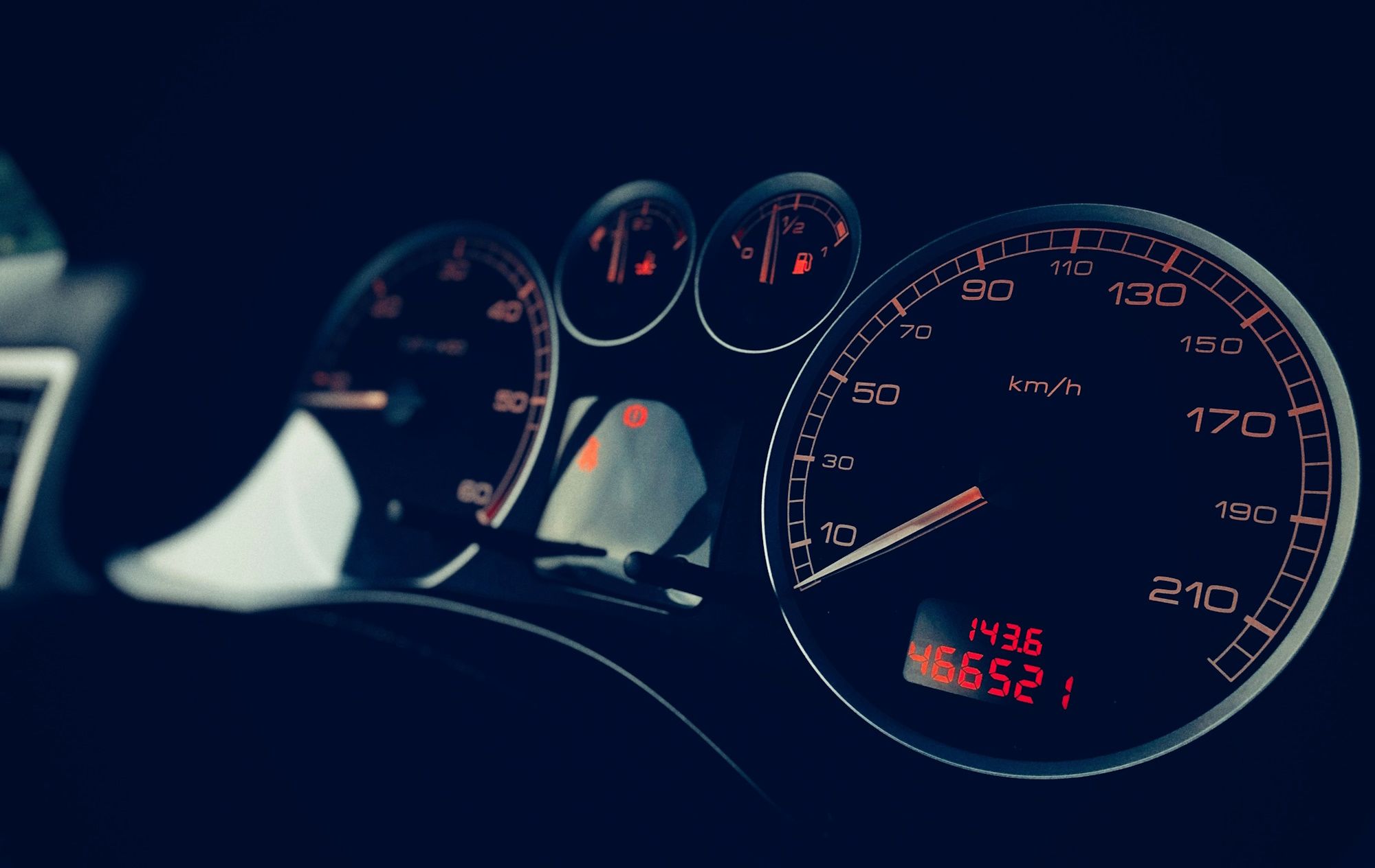 car speedometer in dark lighting