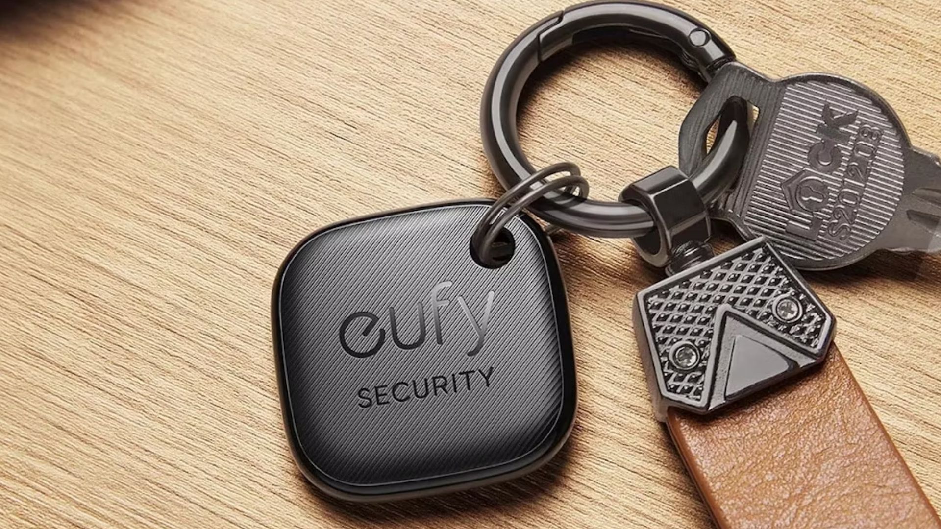 Eufy SmartTrack Link on a keychain on a desk