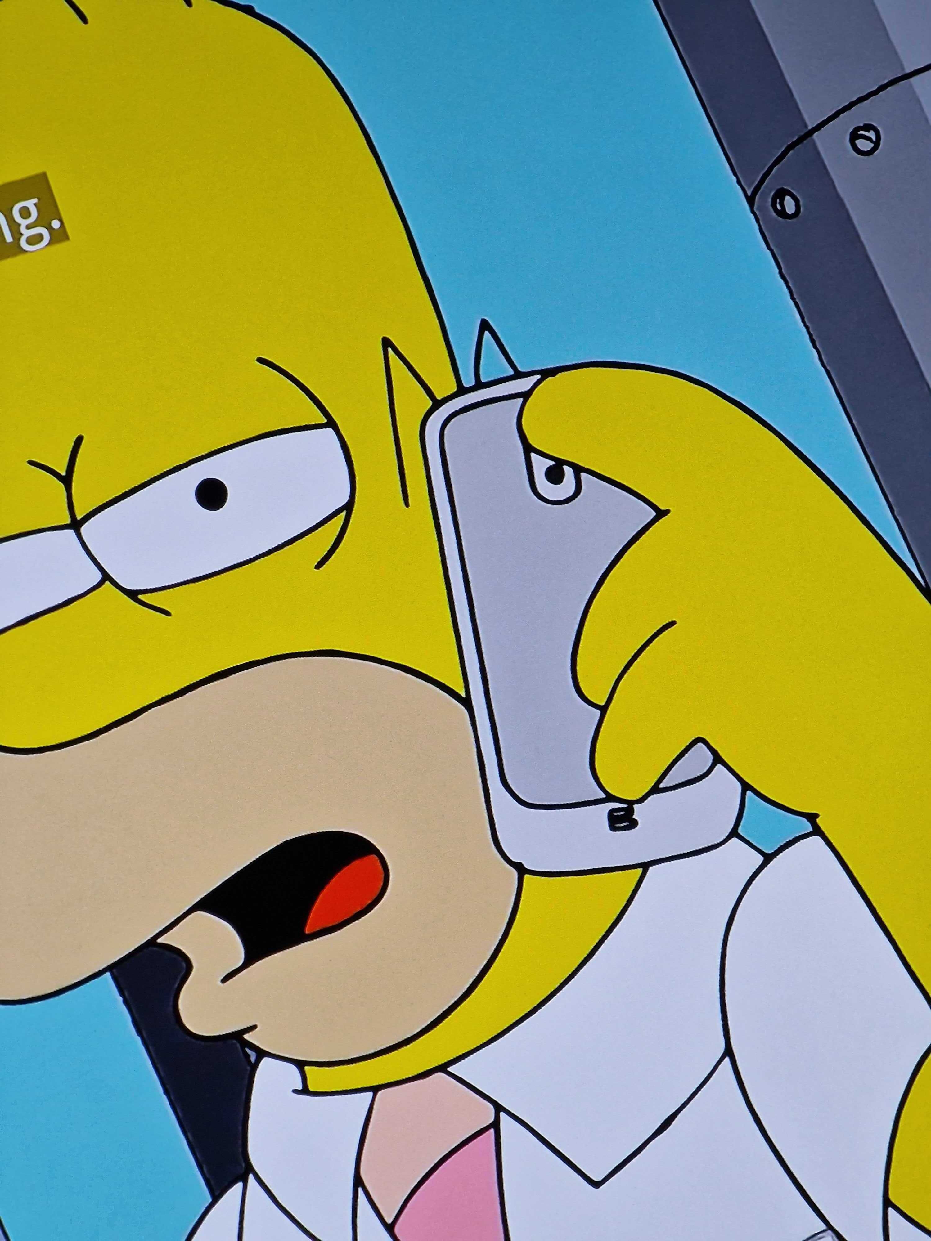 Homer Simpson using a Galaxy Nexus 