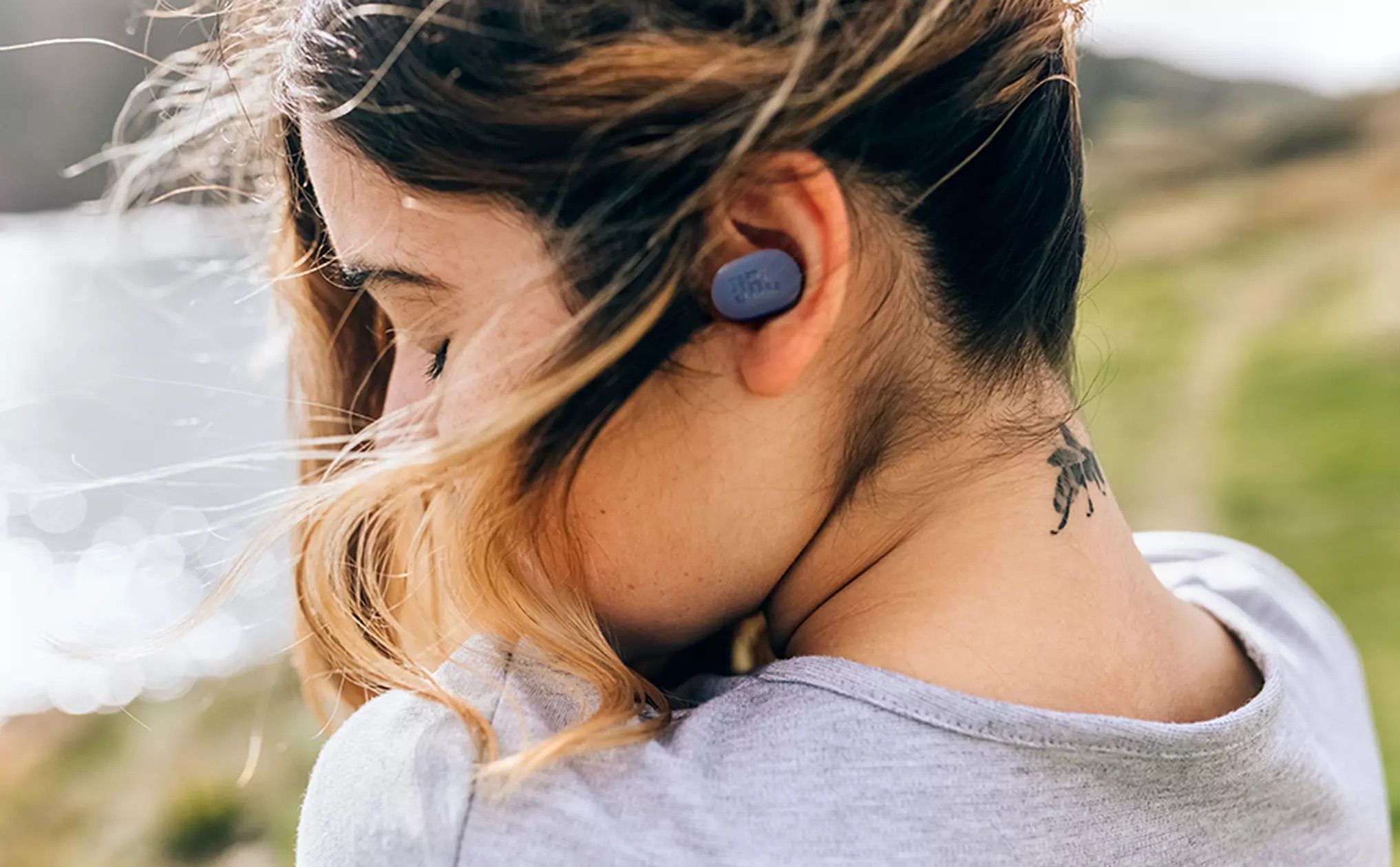 Person with JBL Tune Buds in ear