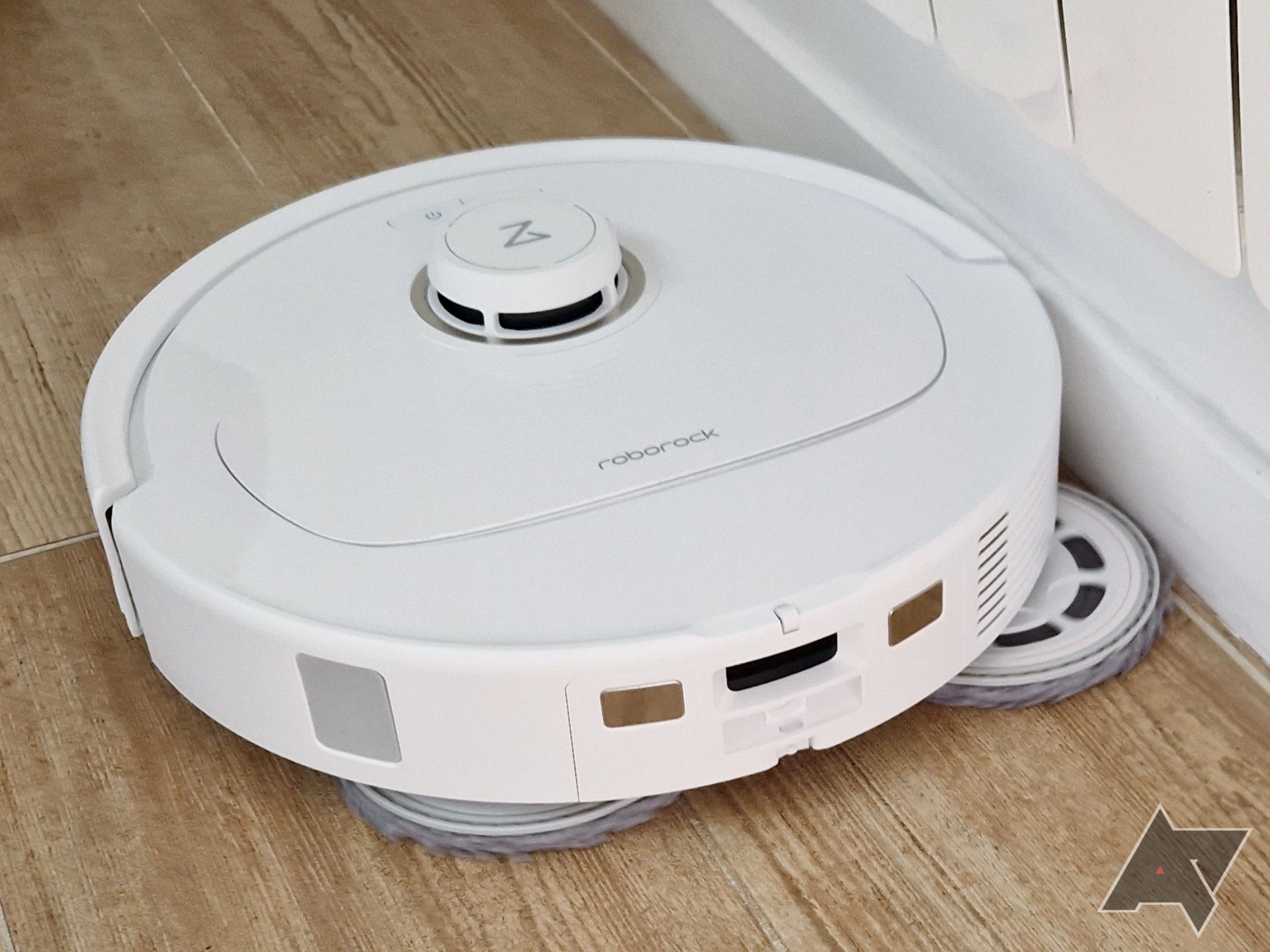 Front view of the Roborock Qrevo MaxV with its FlexiArm mop extended