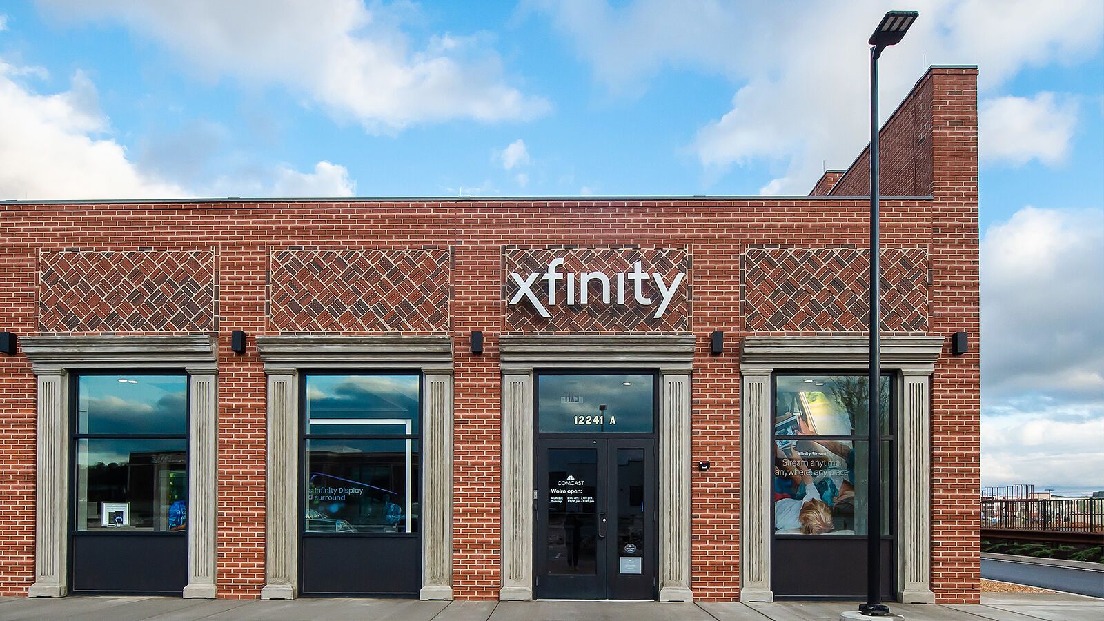 The exterior of a brick Xfinity store