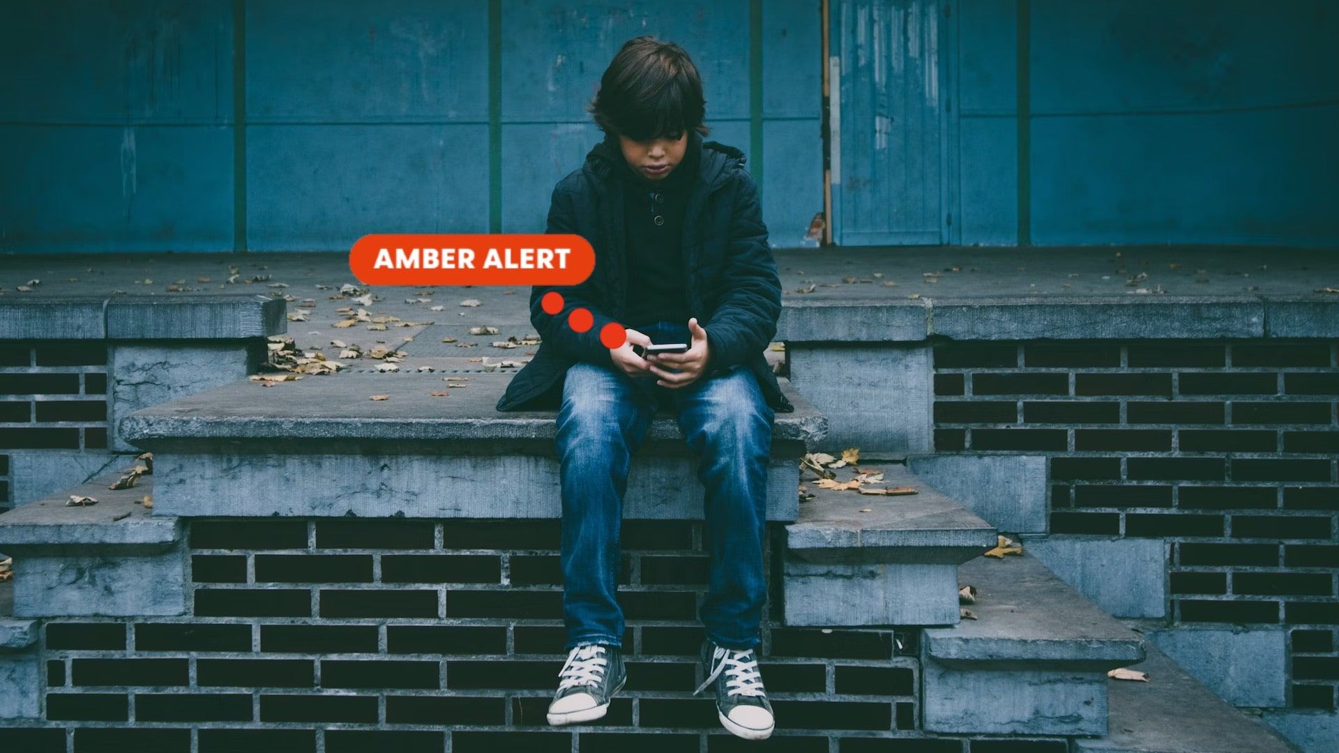 Child looking at phone hero image