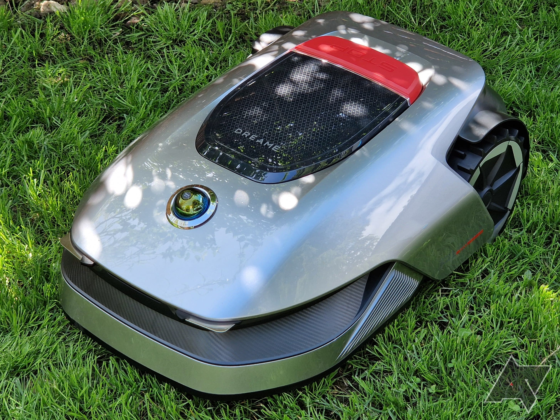 Side view of the Dreametech Robotic Mower A1 on grass