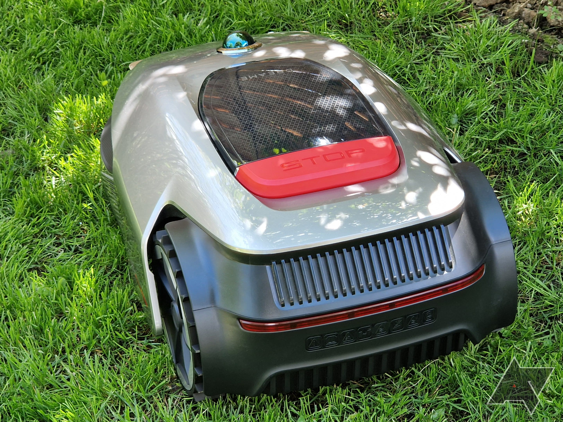 Rear view of the Dreametech Robotic Mower A1 on grass