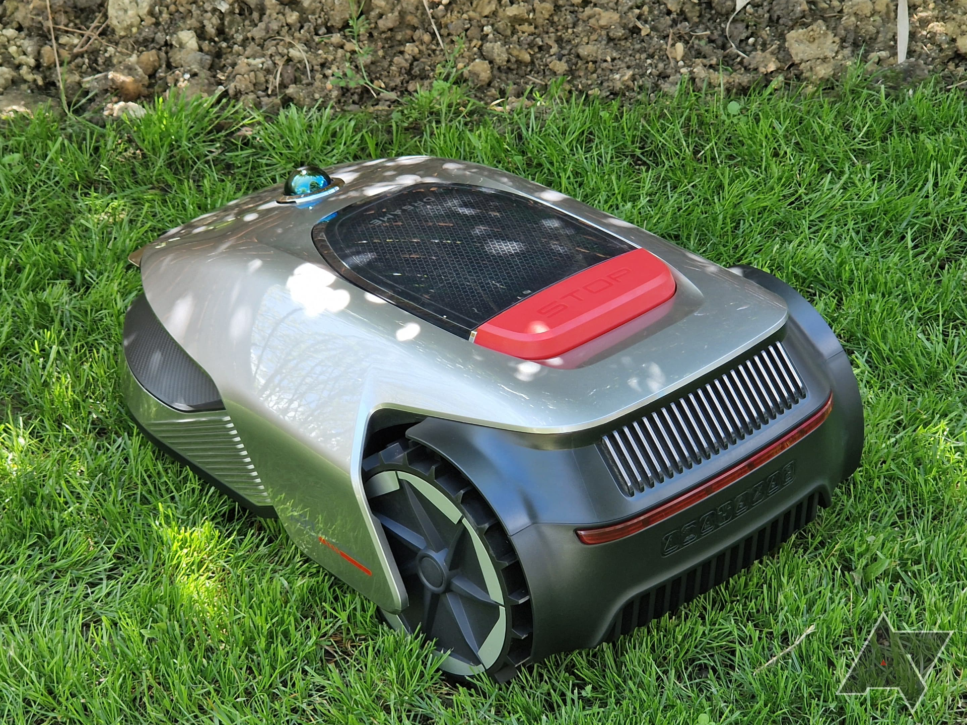 Rear view of the Dreametech Robotic Mower A1 on grass