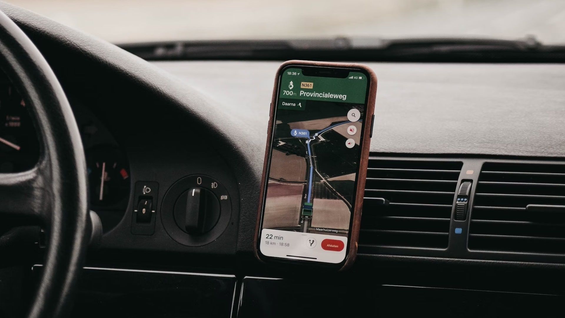 Google Maps on iPhone docked to car dashboard