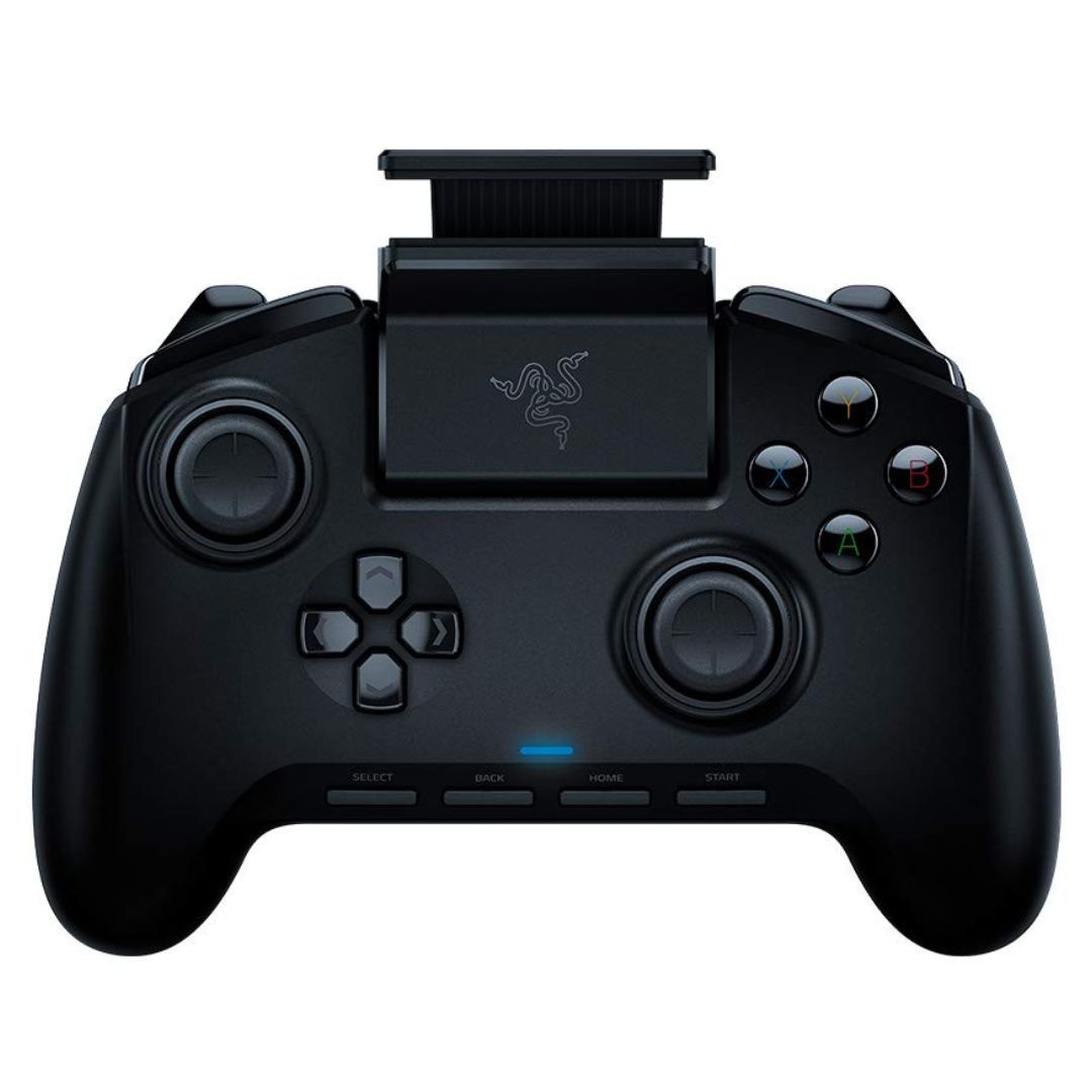 A black game controller with a white backdrop