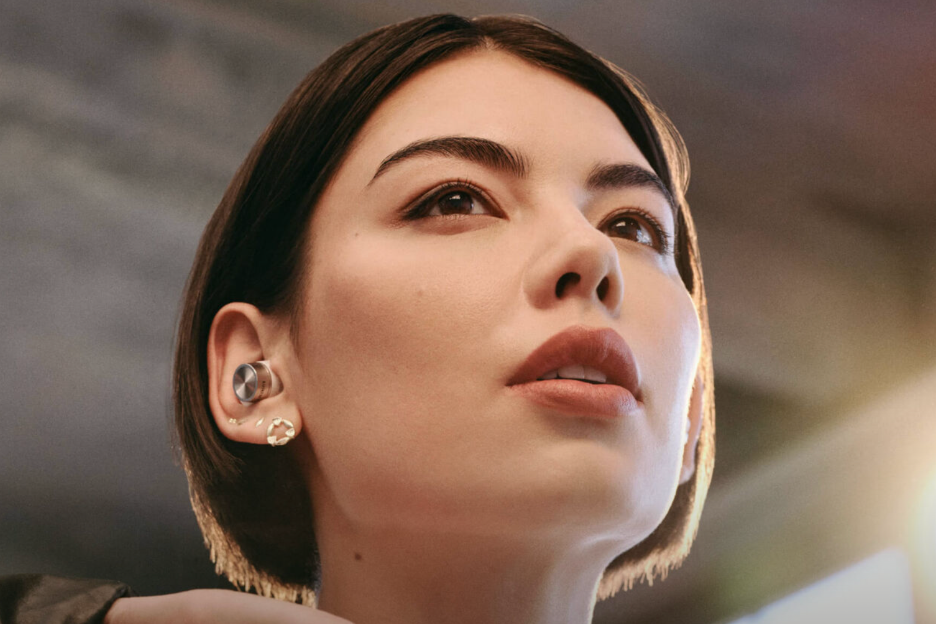 Person wearing Bowers & Wilkins Pi7 S2 True Wireless Earbuds 