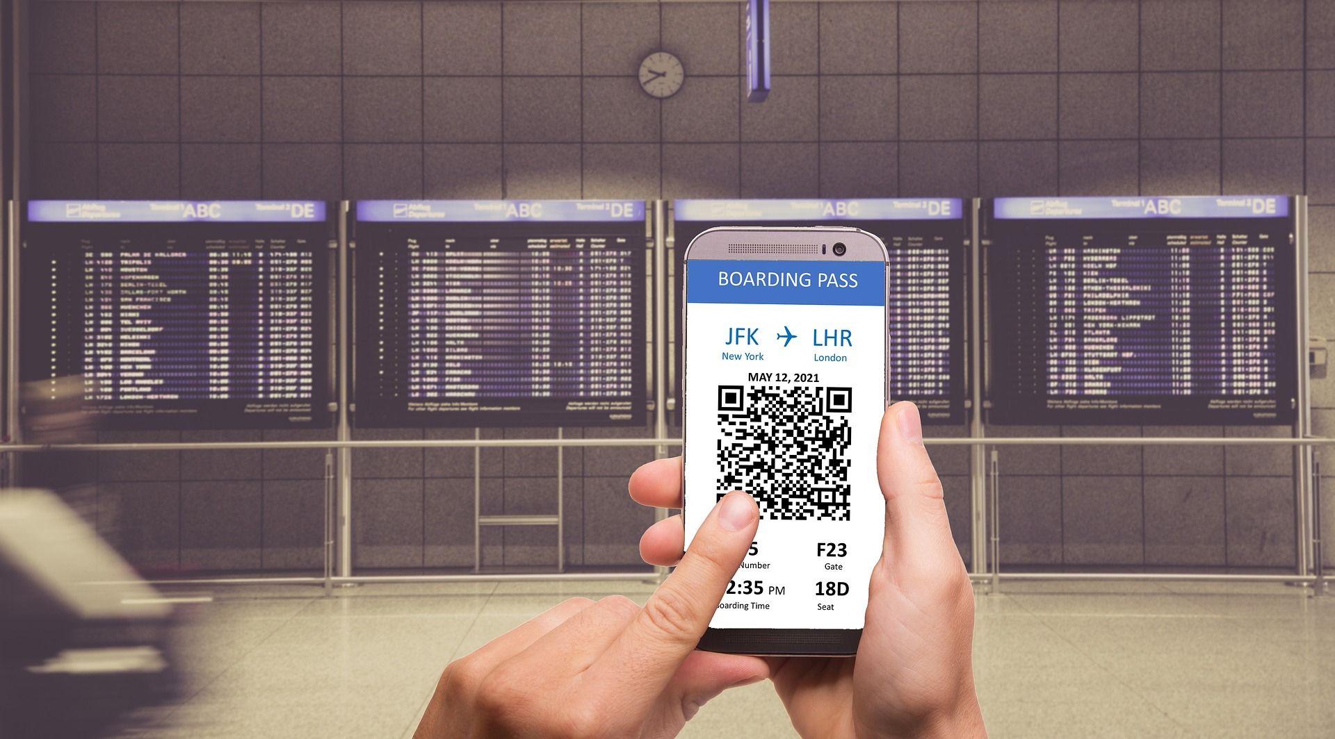 QR code boarding pass displayed on phone