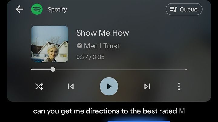 Spotify playing on Android Auto while Assistant hears me ask for Mexican restaurants.