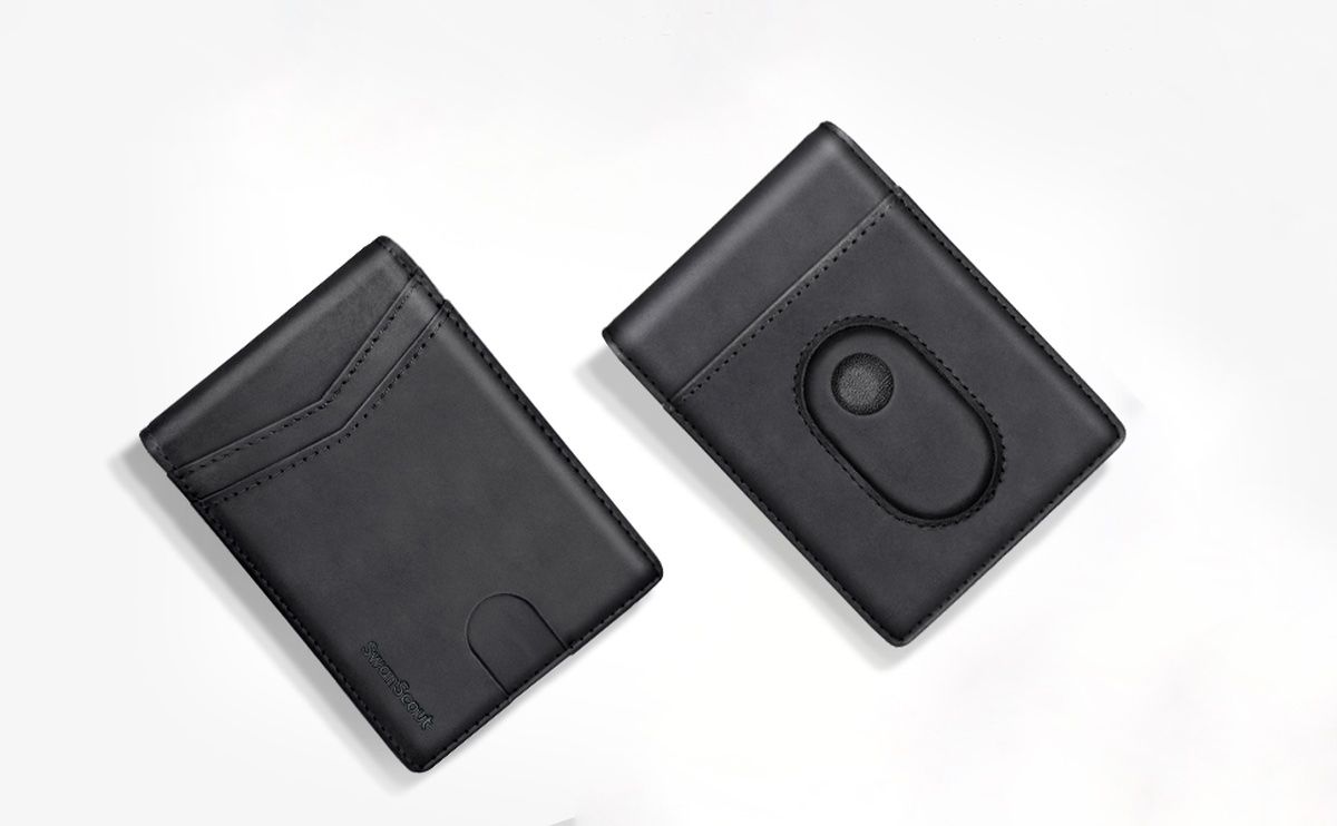 Black leather wallet with spot for SmartTag 2 on gray surface